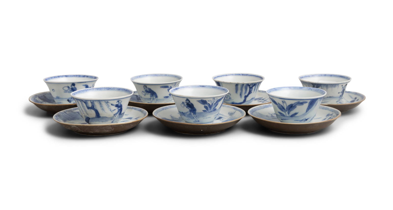 SEVEN BLUE AND WHITE ‘DANCERS’ PATTERN TEABOWLS AND ‘SCHOLAR ON A BRIDGE’