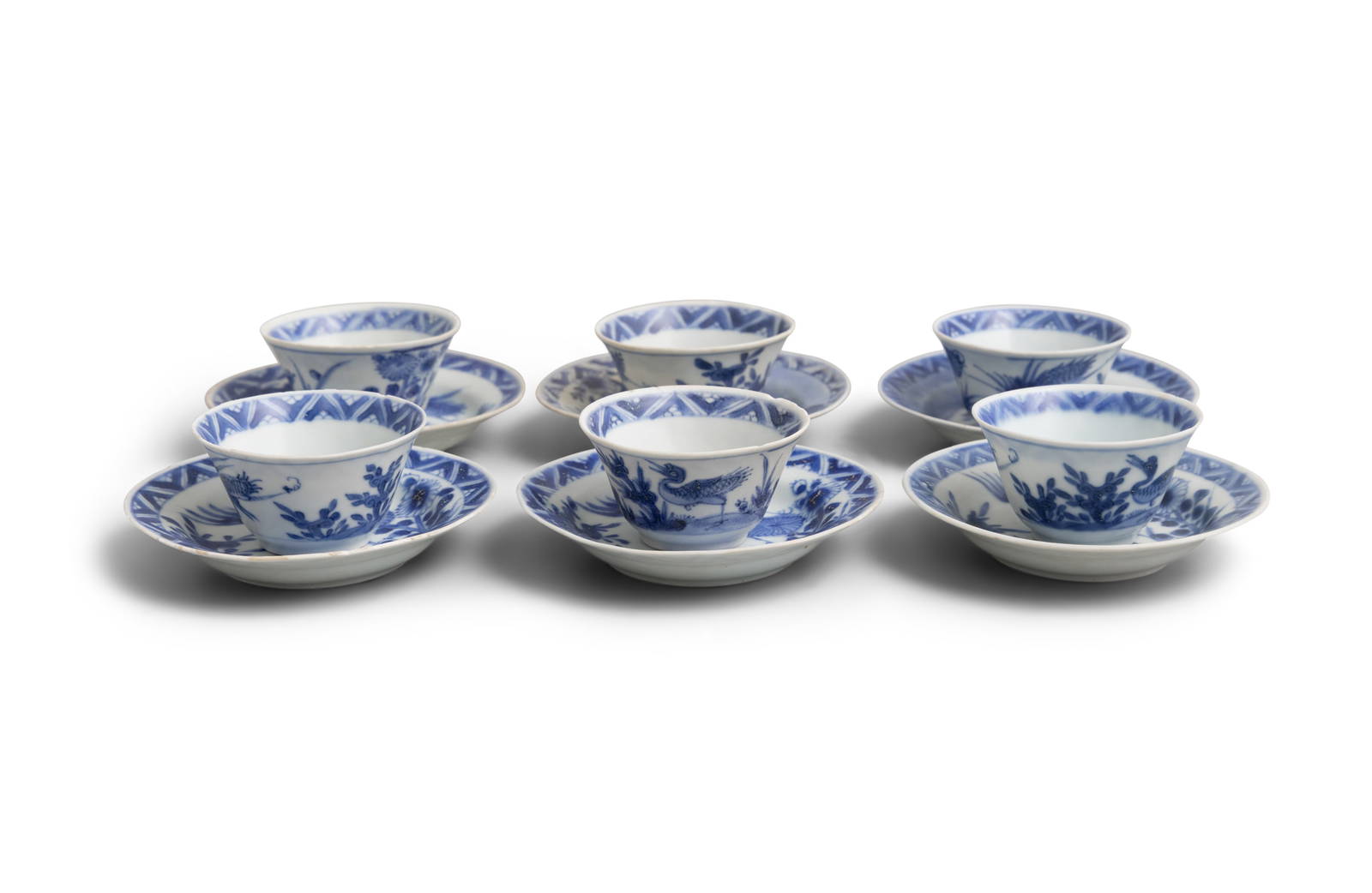 SIX ‘PEASANTS AND CHRYSANTHEMUM’ PATTERN BLUE AND WHITE TEABOWLS AND SAUCERS China,