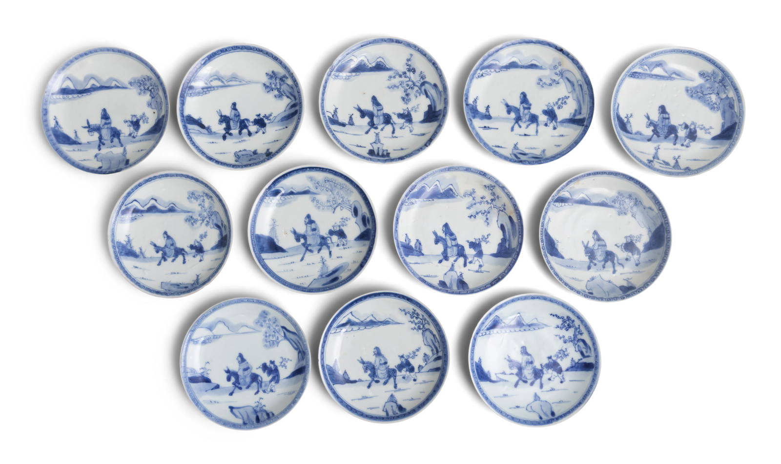 TWELVE ‘SEARCH FOR PLUM-BLOSSOM’ PATTERN BLUE AND WHITE SAUCERS China, Yongzheng