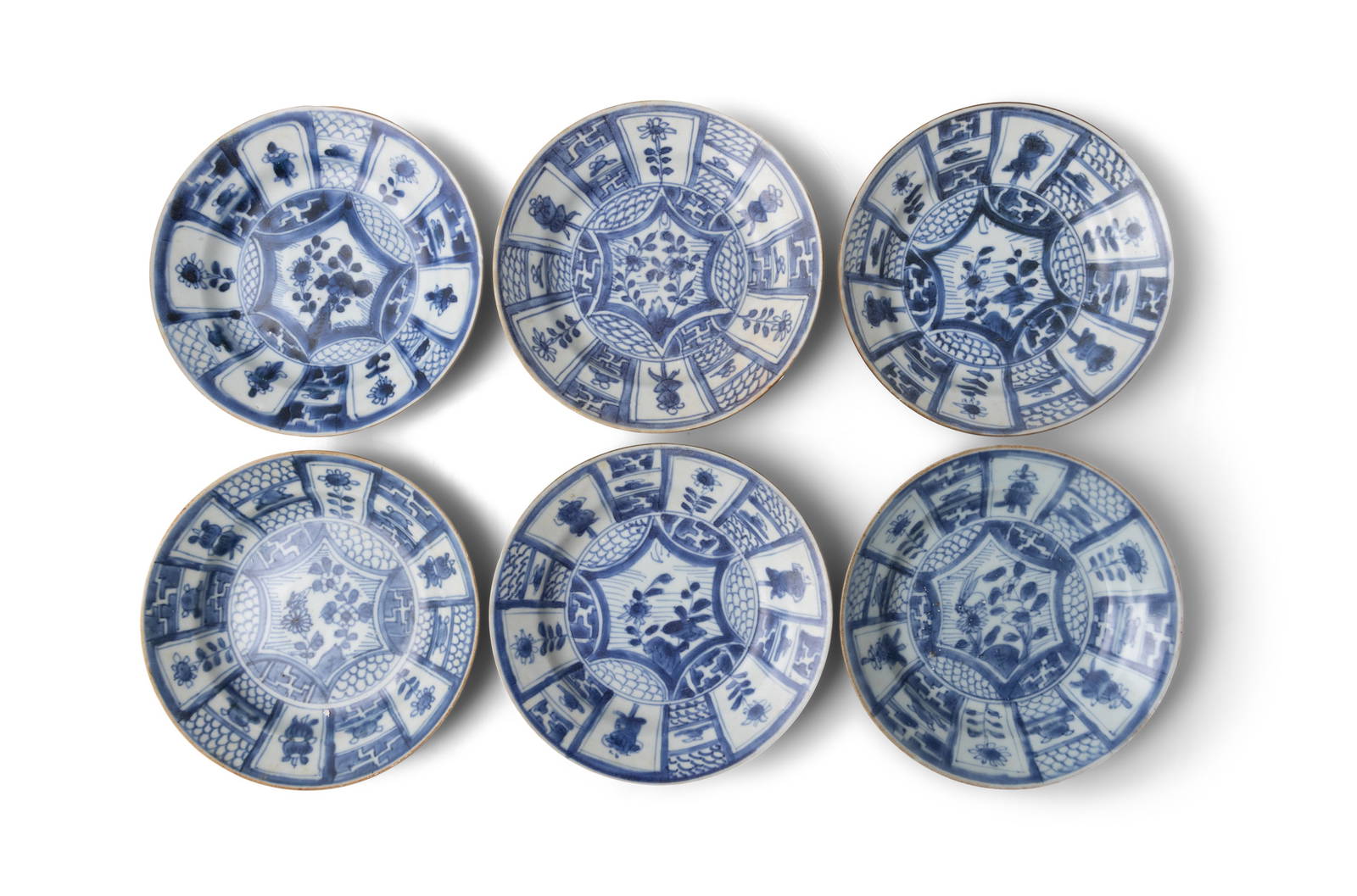 SIX ‘SYMBOLS’ PATTERN BLUE AND WHITE DISHES China, Yongzheng period, circa 1725 With a