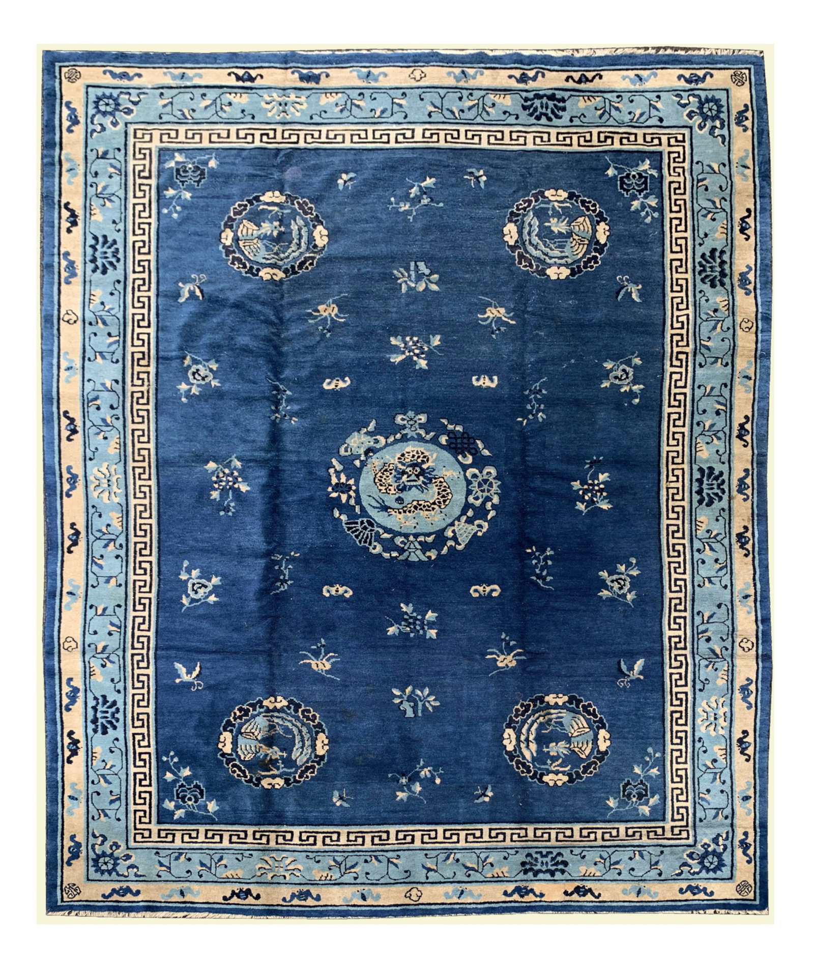 A THREE-TONE BLUE SILK CARPET WITH DRAGON MEDALLION 晚清 石青地: A THREE-TONE BLUE SILK CARPET WITH DRAGON MEDALLION 晚清 石青地团龙纹毯 China, Circa 1880 Size,300 x 400 cm Woven in luxurious silk, the carpet is