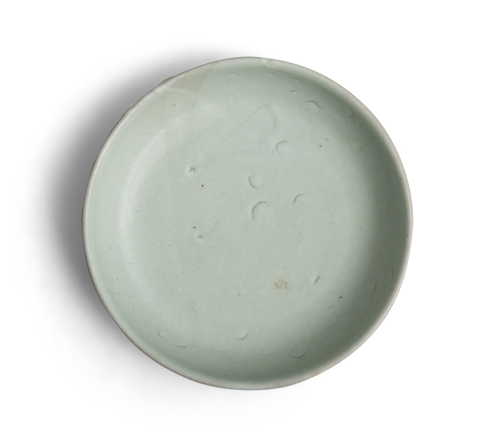A CELADON GLAZED DISH Korea, Koryu period D.10.3cm Publication: SOTHEBY PARKE BERNET(HONG: A CELADON GLAZED DISH Korea, Koryu period D.10.3cm Publication: SOTHEBY PARKE BERNET(HONG KONG) LTD and LANE CRAWFORD HOLDINGS UTD were entities associated with art auctions in Hong Kong, 11-2th May,