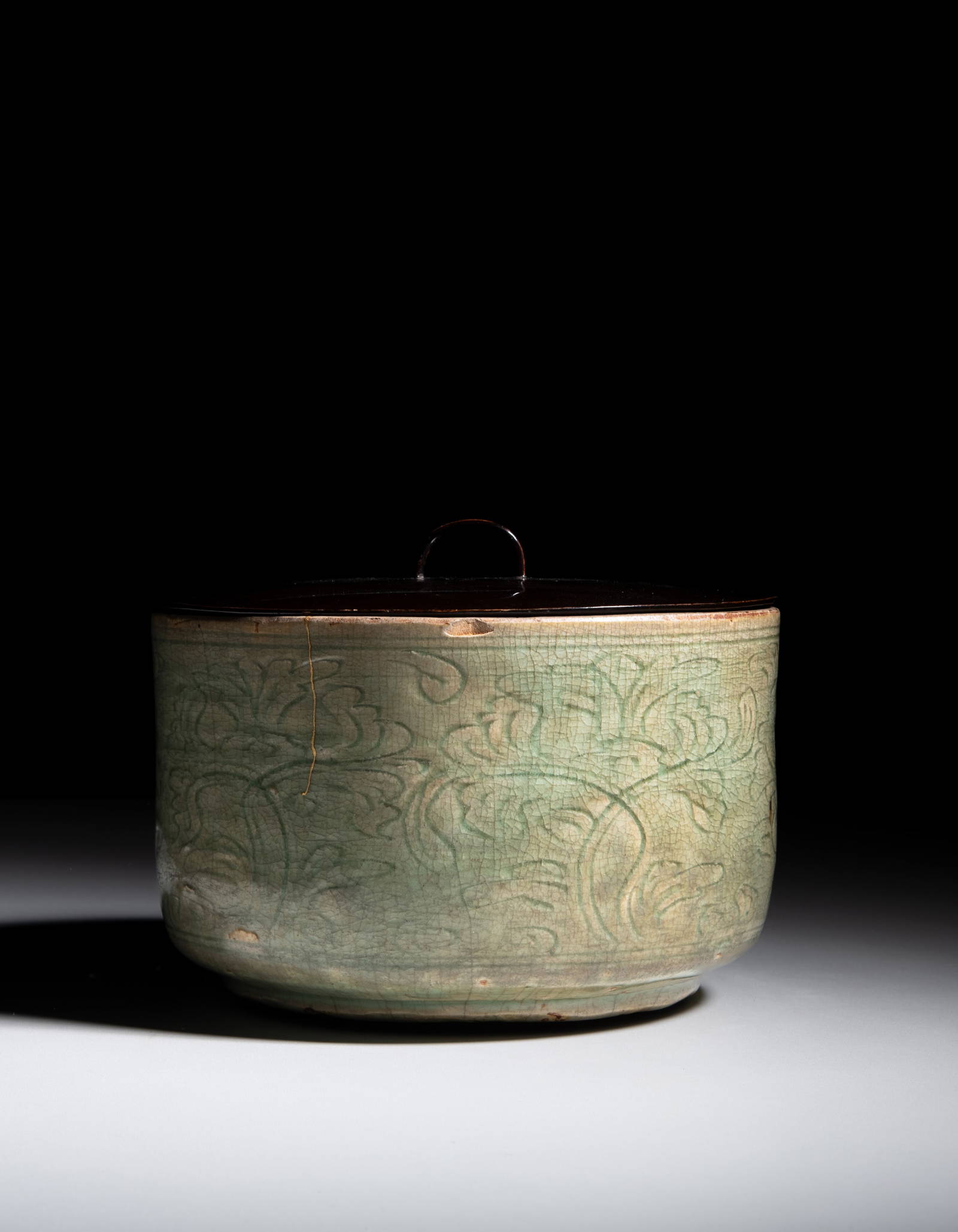 A CARVED CELADON GLAZED'PEONY' WATER POT KENSUI WITH BLACK LACQUERED COVER Korea and Japan, 19 -