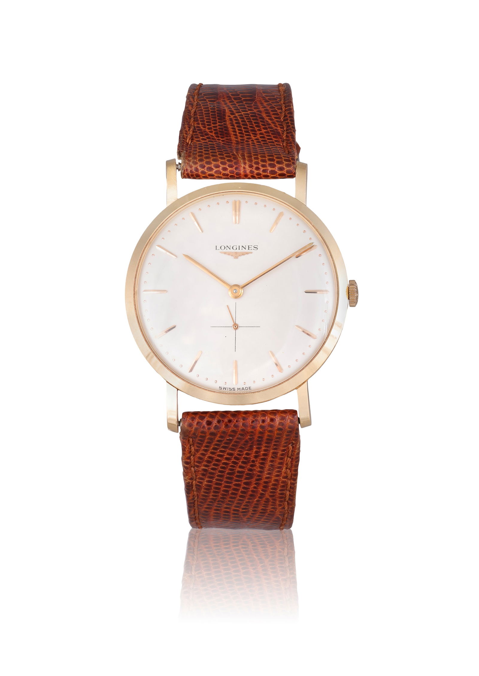 LONGINES REF. 699915, 18K YELLOW GOLD ULTRA-THIN DRESS WATCH An elegant 18K yellow gold manual-wind: LONGINES REF. 699915, 18K YELLOW GOLD ULTRA-THIN DRESS WATCH An elegant 18K yellow gold manual-wind wristwatch. Year: Circa 1960s Dial: Silvered dial with applied gold baton indices, outer dot minute