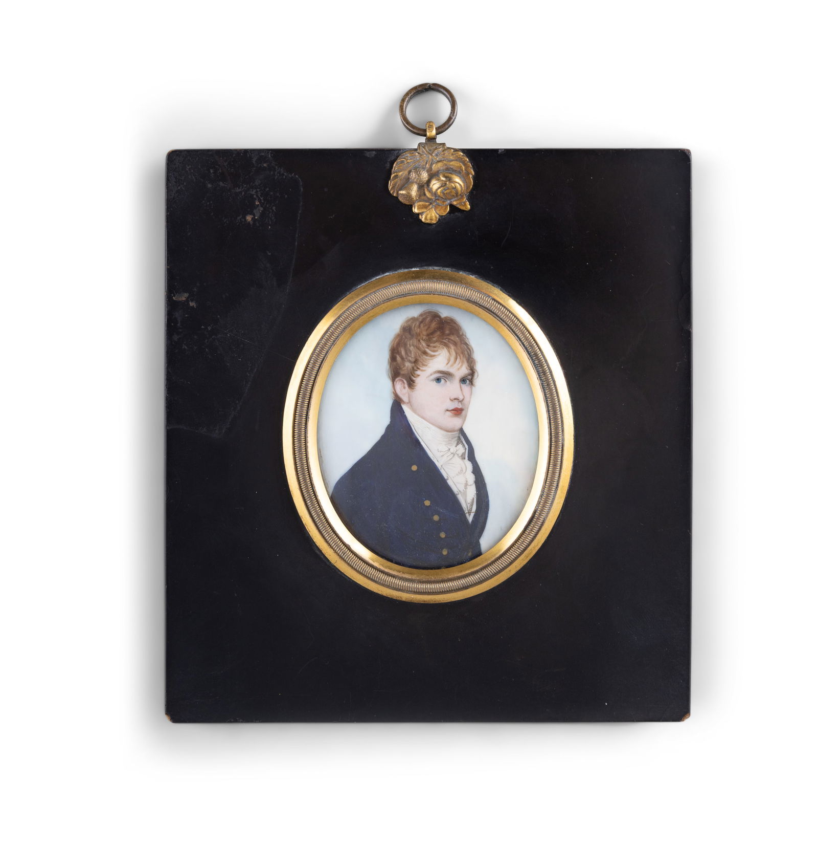 FREDERICK BUCK (1771-1840) Miniature portrait of a young man in Regency dress with auburn hair: FREDERICK BUCK (1771-1840) Miniature portrait of a young man in Regency dress with auburn hair Watercolour and gouache on ivory, oval, 6.2 x 5cm Encased in a gilt metal and lacquered wood frame 13.5 x