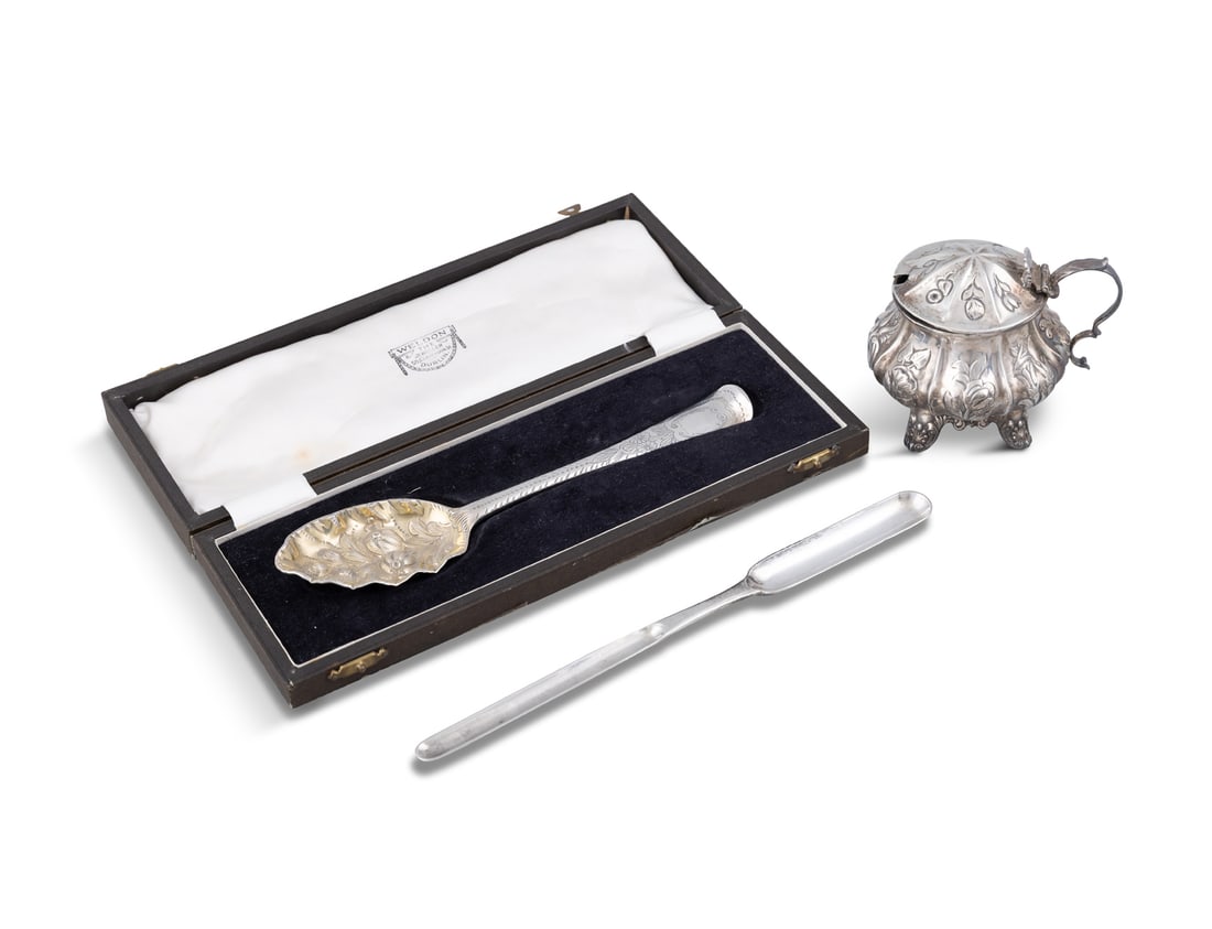 AN IRISH GEORGE III SILVER BERRY SPOON Dublin c. 1774, check makers mark, cased; together with a (1 of 4)