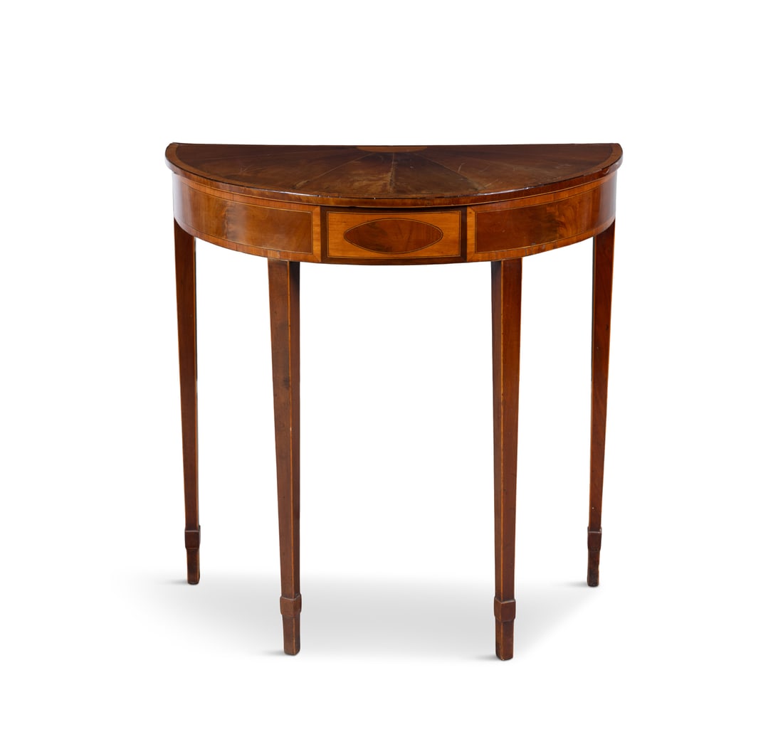 AN IRISH INLAID SATINWOOD DEMI-LUNE SIDE TABLE, the cross banded top with radial veneers, above a (1 of 3)