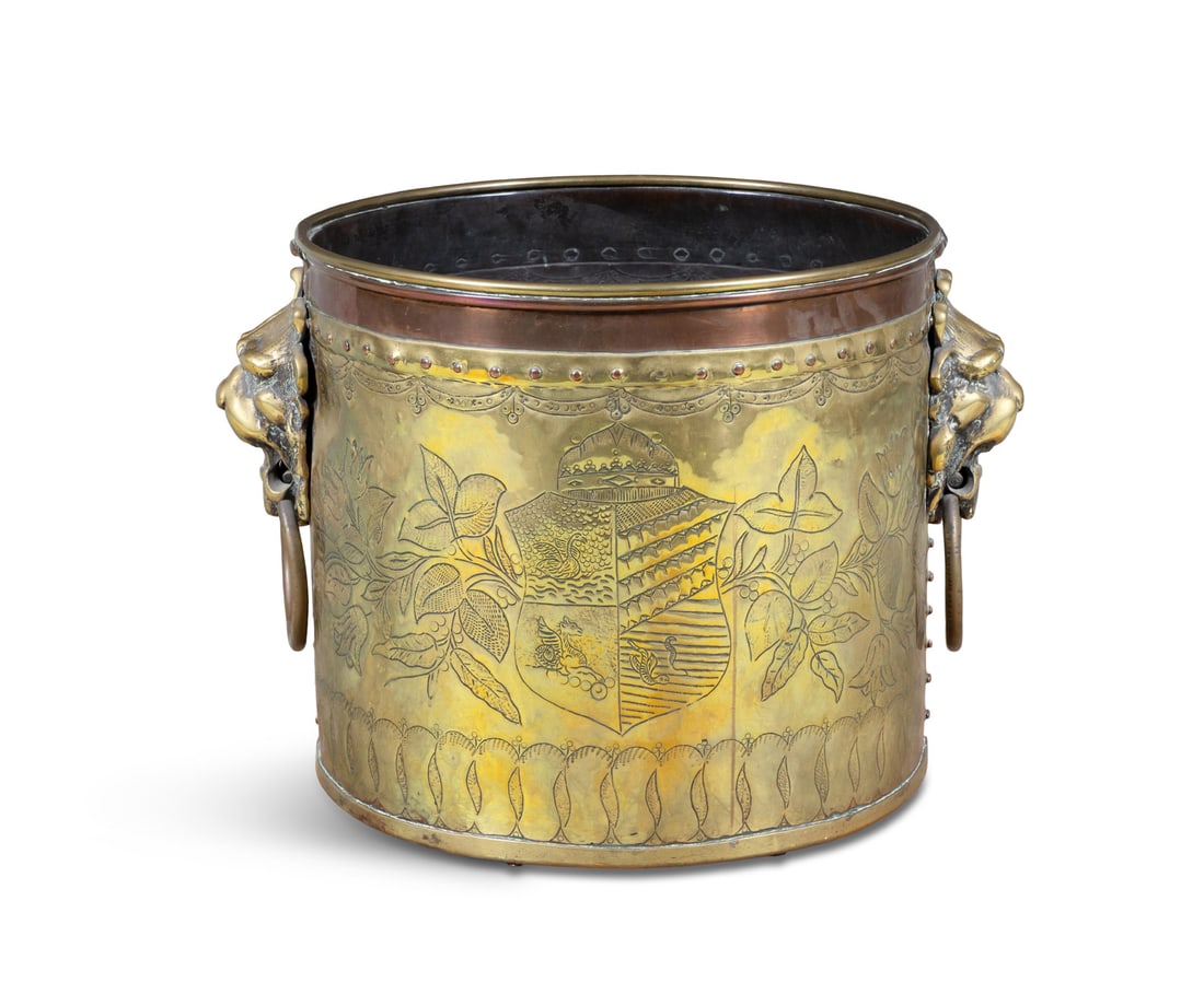 A LARGE BRASS AND COPPER FUEL BUCKET of cylindrical form, the body engraved with crest and fruiting (1 of 5)