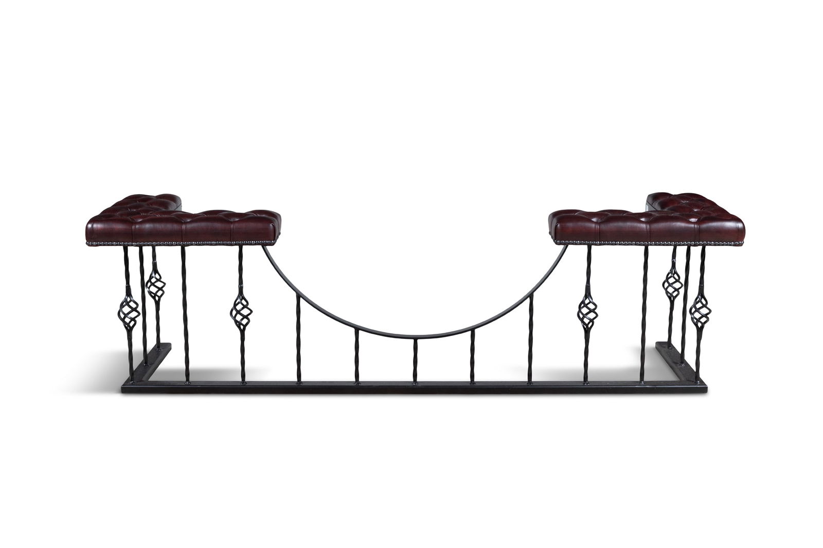 A STEEL FRAMED AND BUTTON BACK LEATHER UPHOLSTERED CLUB FENDER, MODERN with padded red leather (1 of 3)