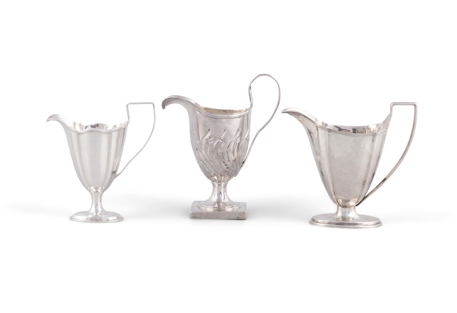 A COLLECTION OF THREE SILVER CREAM JUGS, - Britannia silver example, London 1901 - Birmingham 1900 (1 of 4)