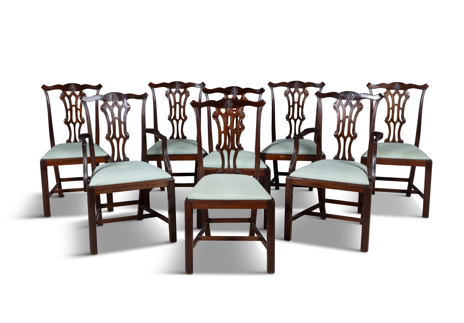 A SET OF EIGHT MAHOGANY CHIPPENDALE STYLE DINING CHAIRS comprising two carvers and six singles, (1 of 6)