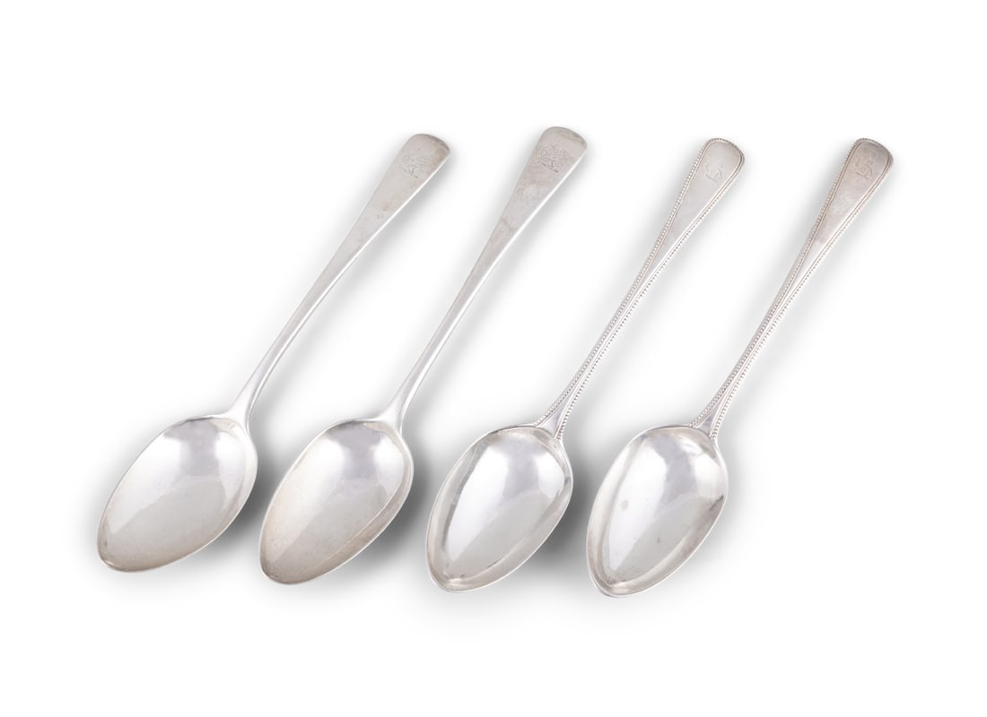 A COLLECTION OF FOUR HANOVERIAN SILVER TABLE SPOONS, comprising: - a pair of George III table (1 of 4)