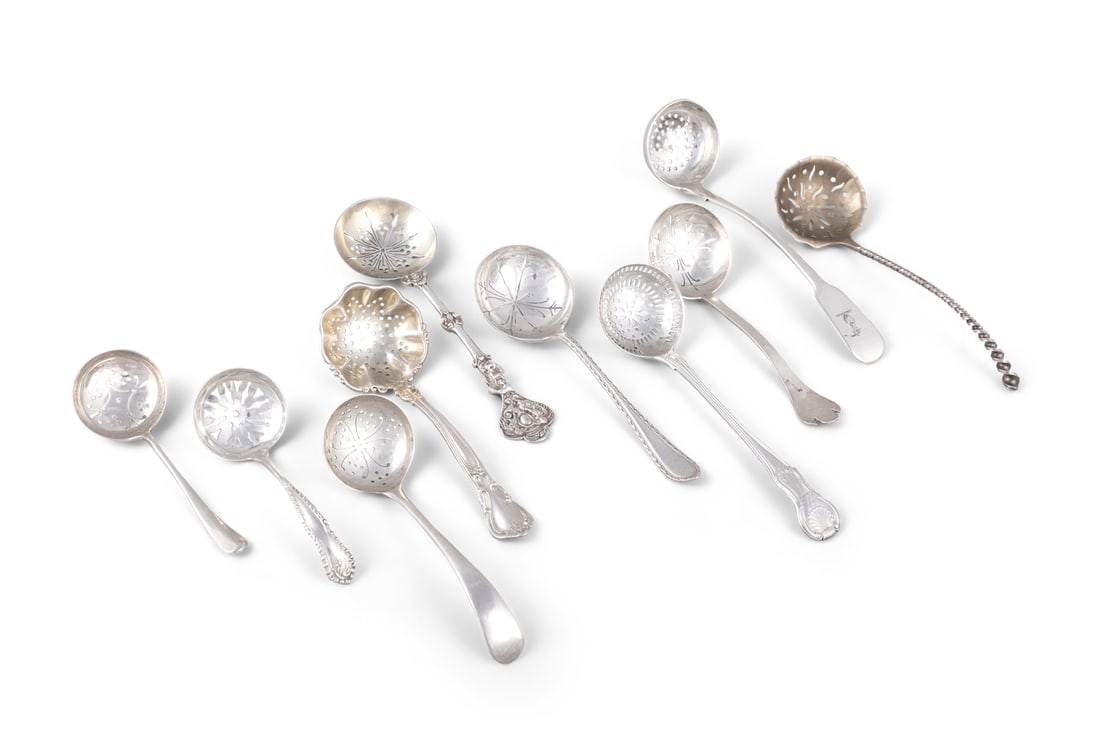 A LARGE MISCELLANEOUS COLLECTION OF SILVER STRAINING SPOONS, (c.9.5 troy ozs) (1 of 8)