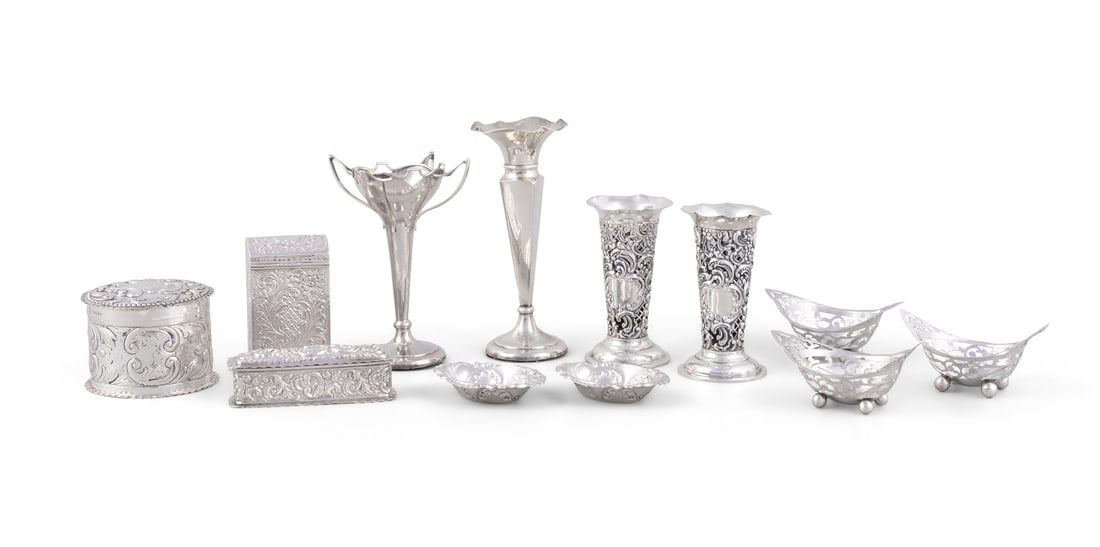 AN ASSORTED COLLECTION OF CHASED AND EMBOSSED SILVERWARES, comprising a pair of peony vases, three (1 of 6)