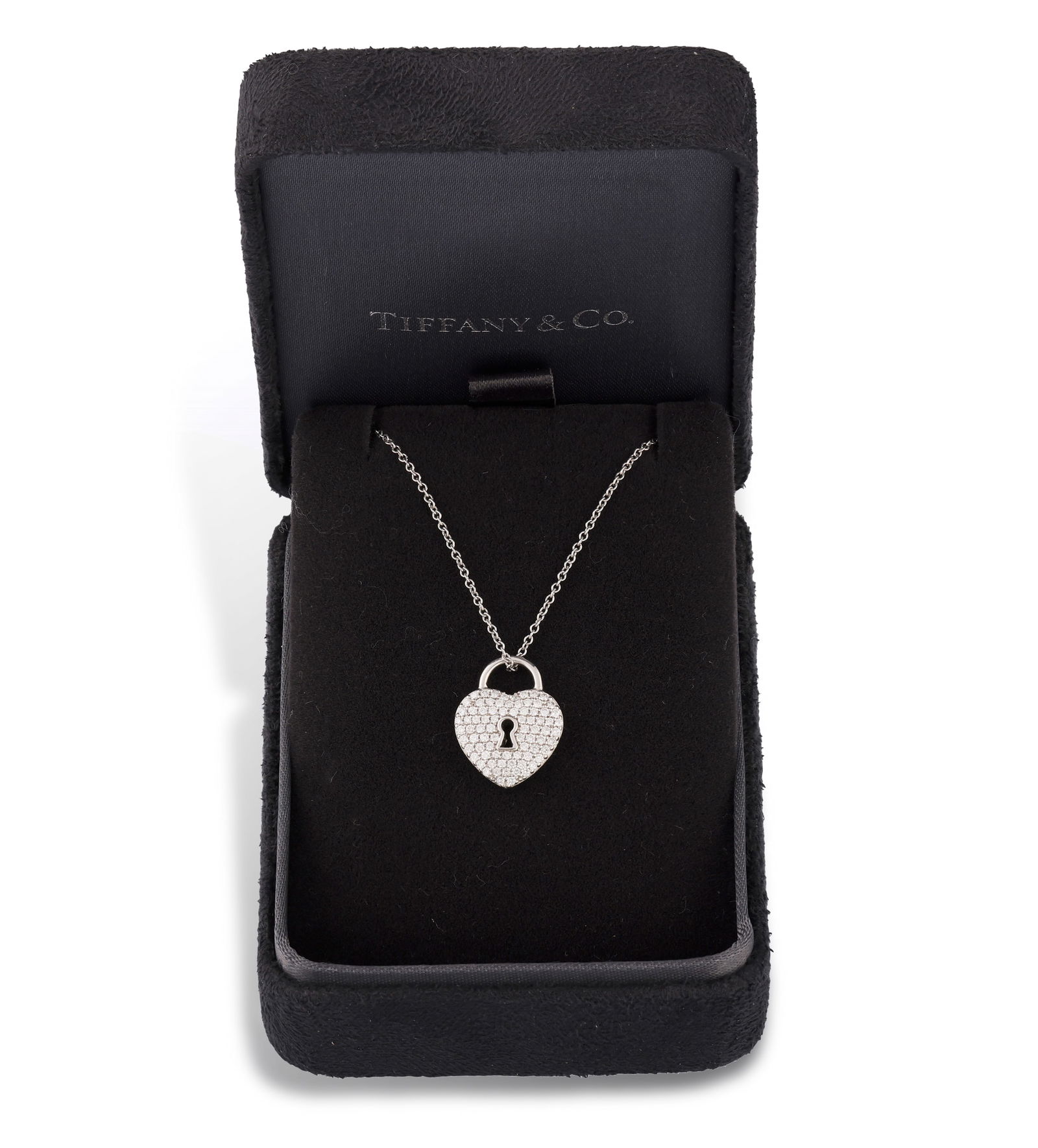 TIFFANY & CO.: A DIAMOND PENDANT NECKLACE  Designed as a padlock, pavé-set with brilliant-cut