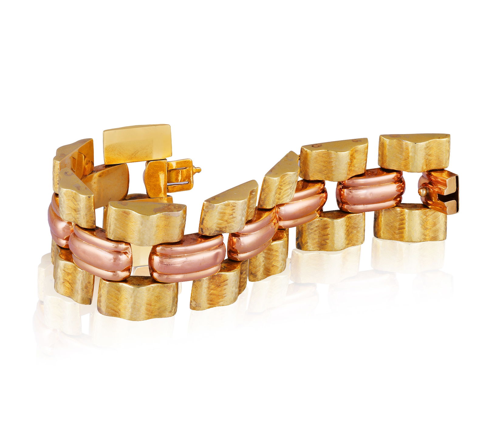 A RETRO GOLD BRACELET, CIRCA 1945 * of tank bi-coloured design * mounted in 14K yellow and rose gold (1 of 4)