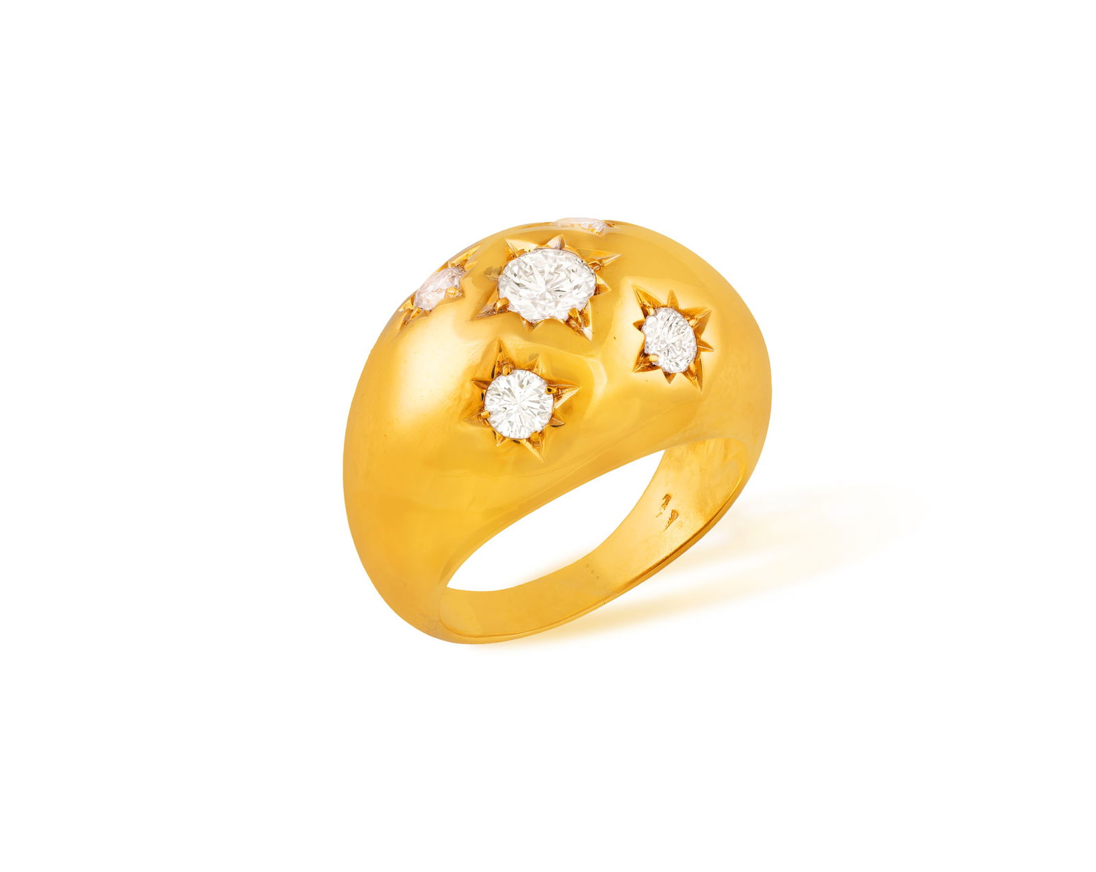 A DIAMOND BOMBÉ RING * brilliant-cut diamonds, approx. 1.10cts total * mounted in 18K gold * (1 of 3)