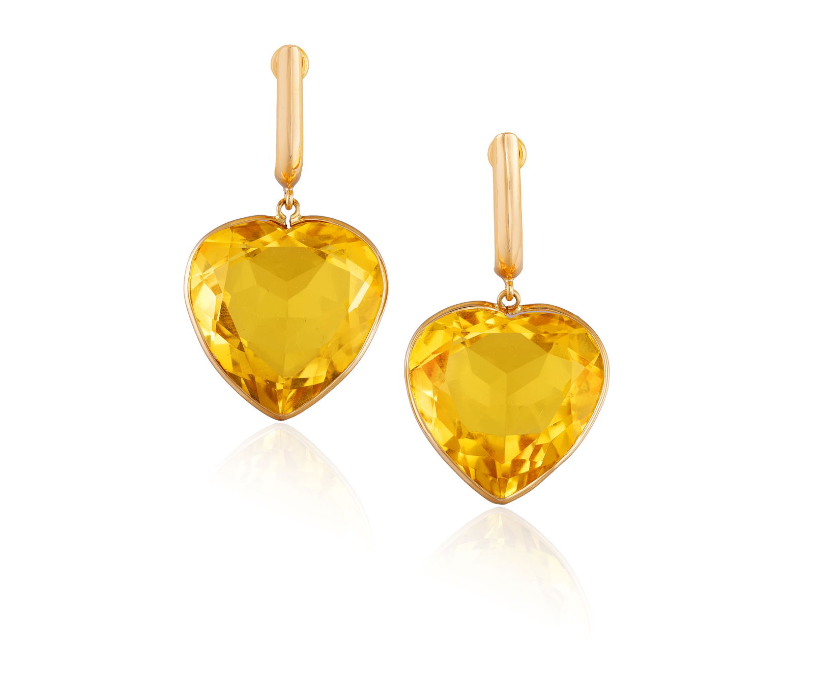 A PAIR OF CITRINE PENDENT EARRINGS * two heart-shaped citrines, approx. 14.00cts total * mounted in (1 of 2)