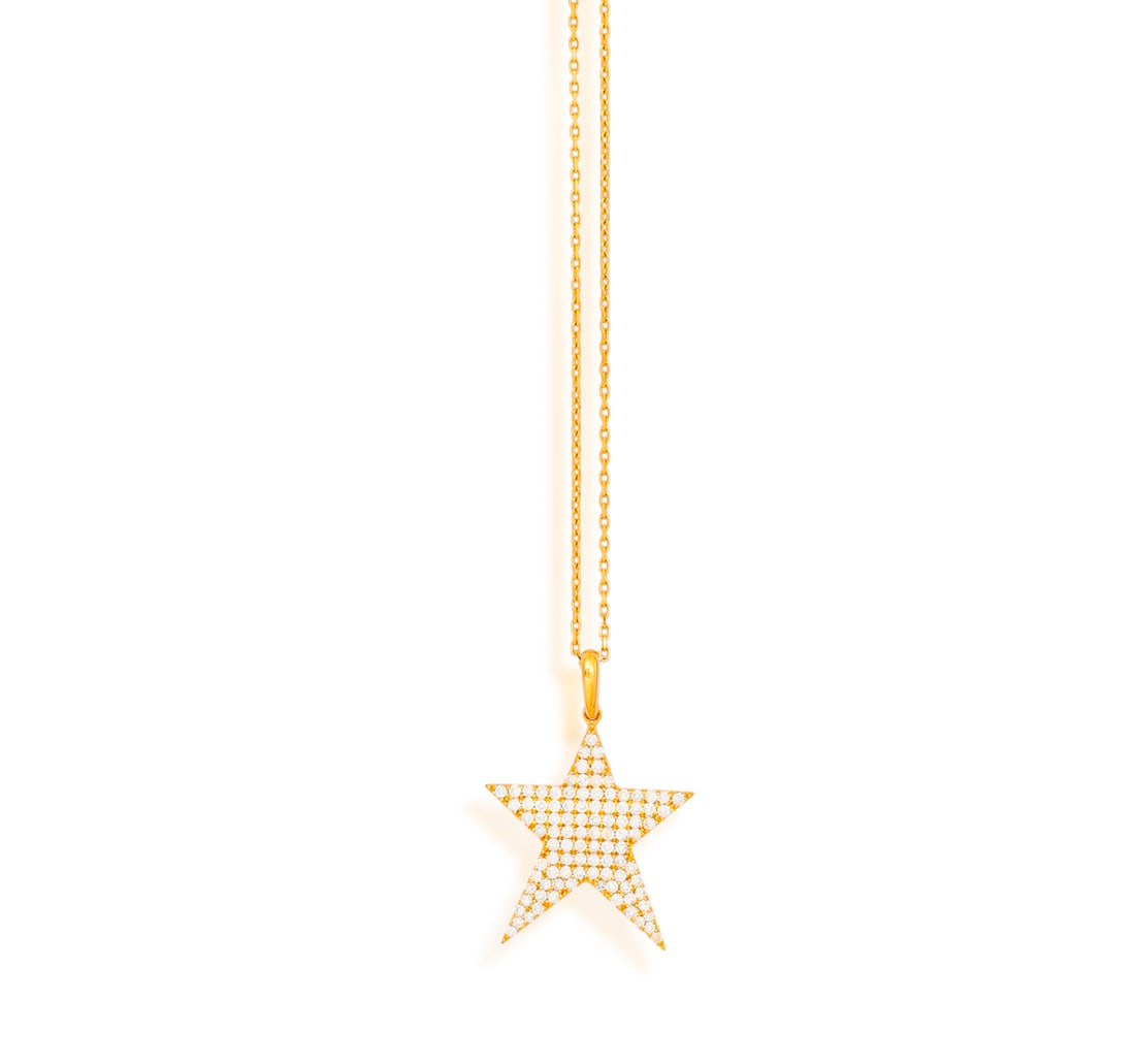 A DIAMOND STAR PENDANT ON CHAIN * brilliant-cut diamonds * mounted in 18K gold * length pendant (1 of 2)