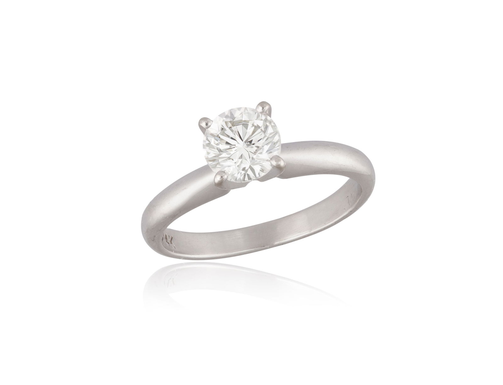 A DIAMOND SINGLE-STONE RING * brilliant-cut diamond *_mounted in 14K gold * ring size I * with GSI (1 of 2)