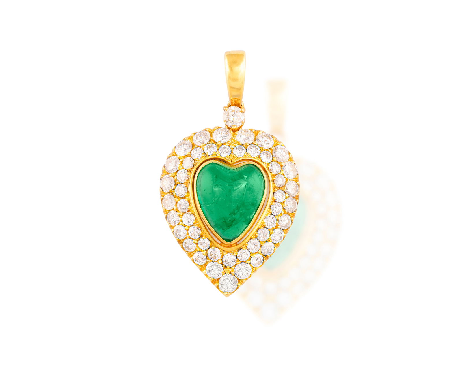 AN EMERALD AND DIAMOND PENDANT * one heart-shaped emerald cabochon, approx. 3.70cts * brilliant-cut (1 of 2)