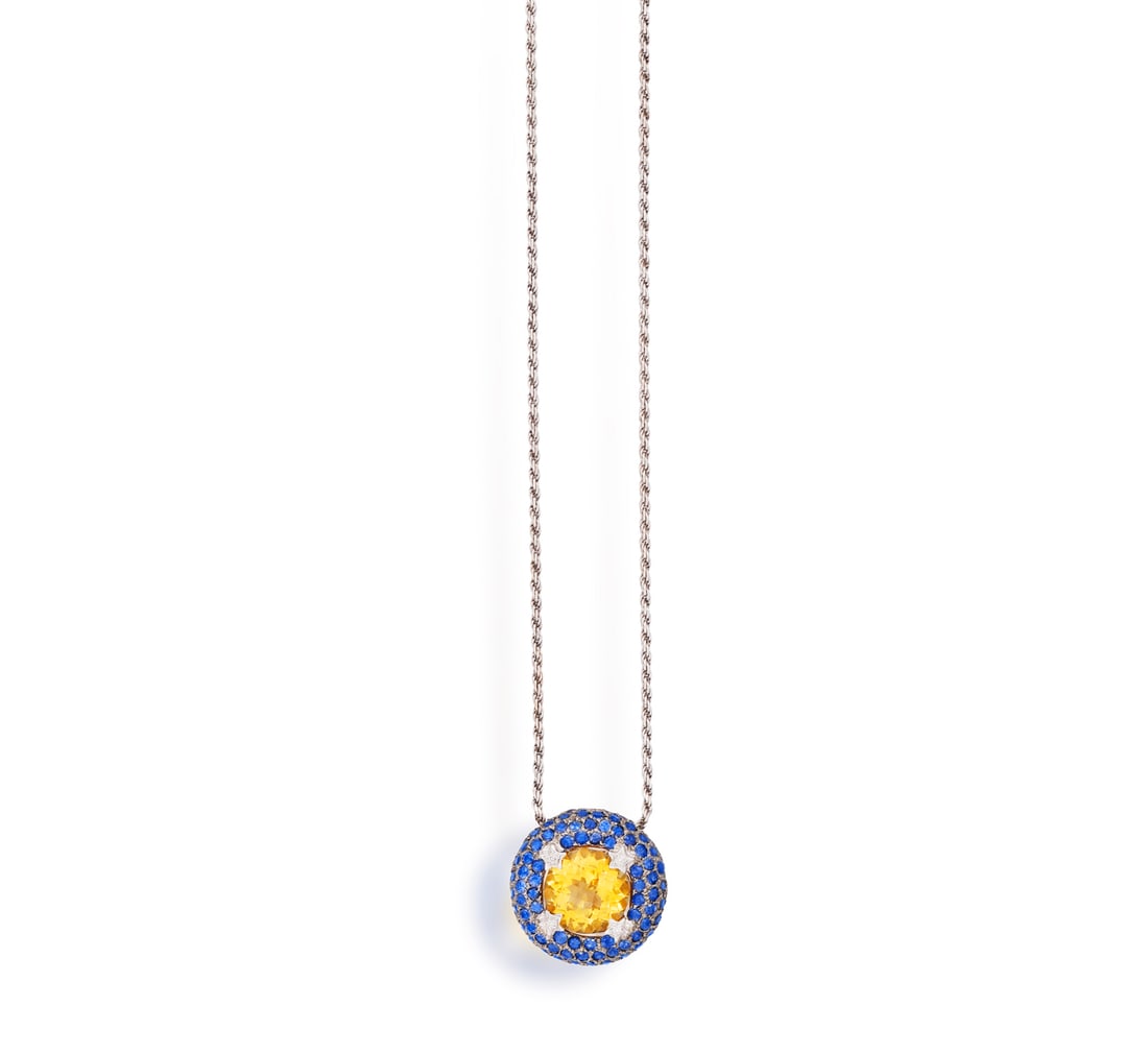 A CITRINE, SAPPHIRE AND DIAMOND PENDANT NECKLACE * a circular-faceted citrine, approx. 4.10cts total (1 of 2)