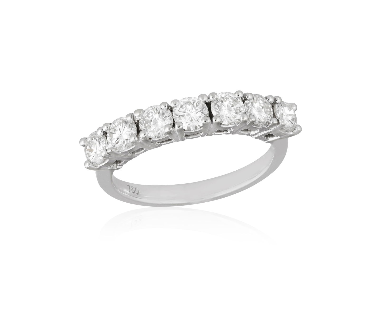 A DIAMOND HALF-ETERNITY RING * seven brilliant-cut diamonds * diamonds approximately 1.10cts total * (1 of 2)