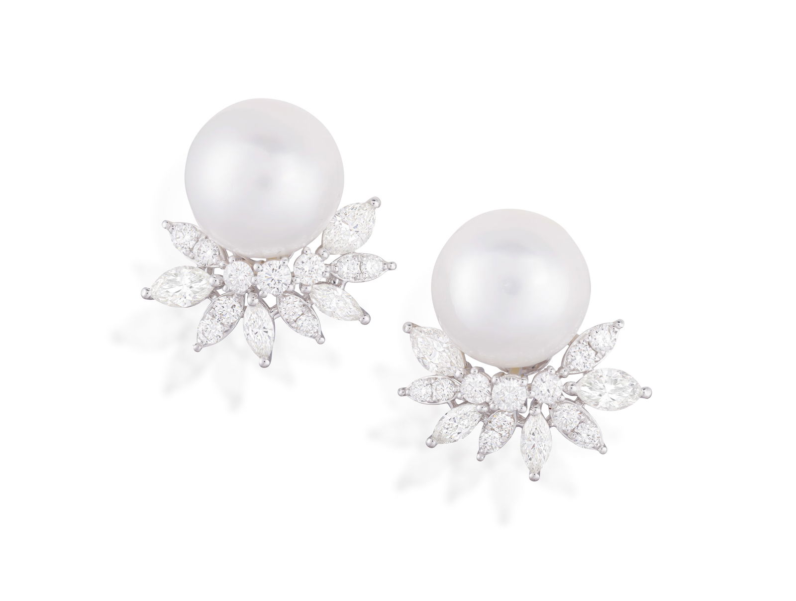 A PAIR OF CULTURED PEARL AND DIAMOND EARRINGS * two cultured pearls of white tint, measuring approx. (1 of 2)