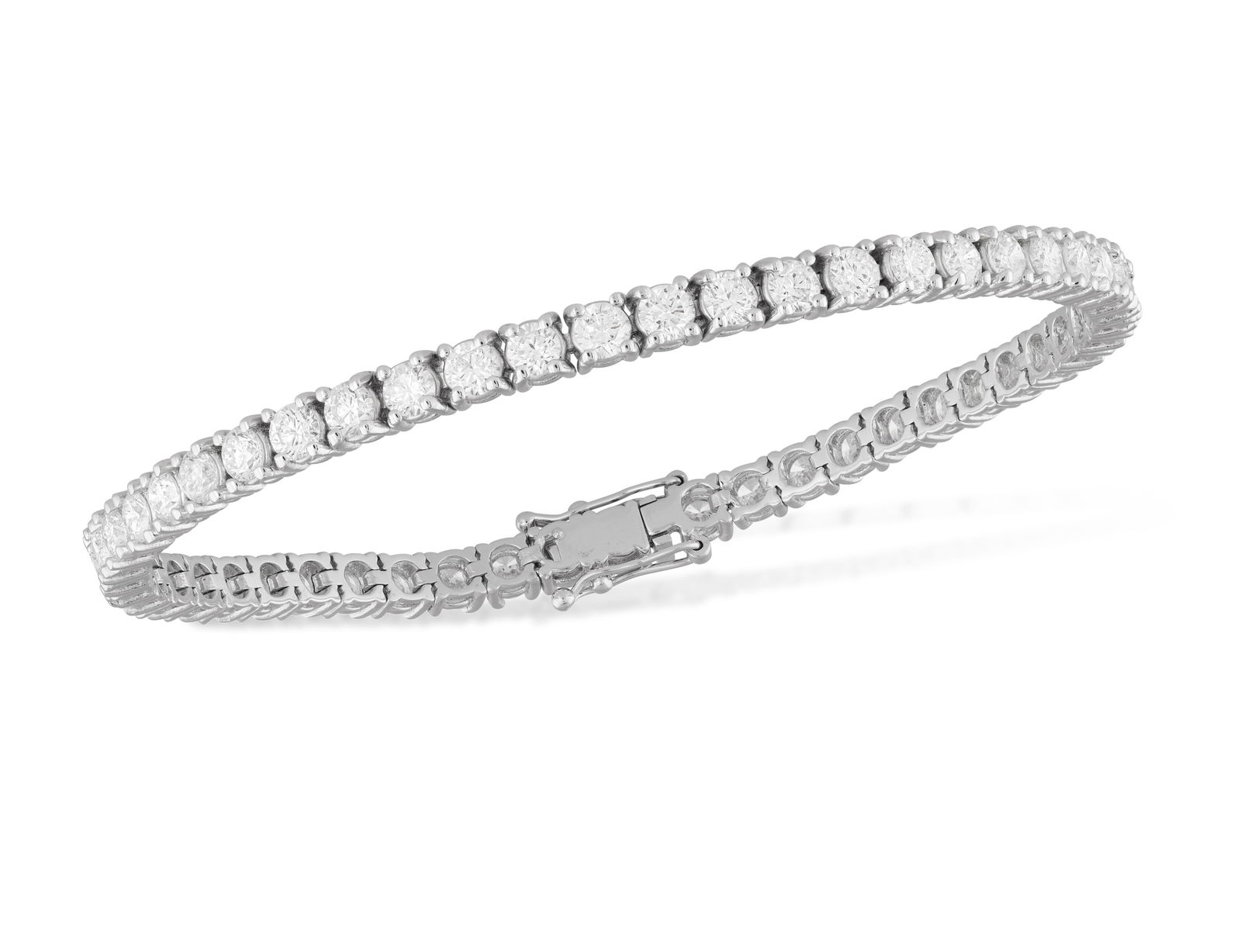 A DIAMOND LINE BRACELET * brilliant-cut diamonds, approx. 6.00cts total * mounted in 18K gold * (1 of 3)