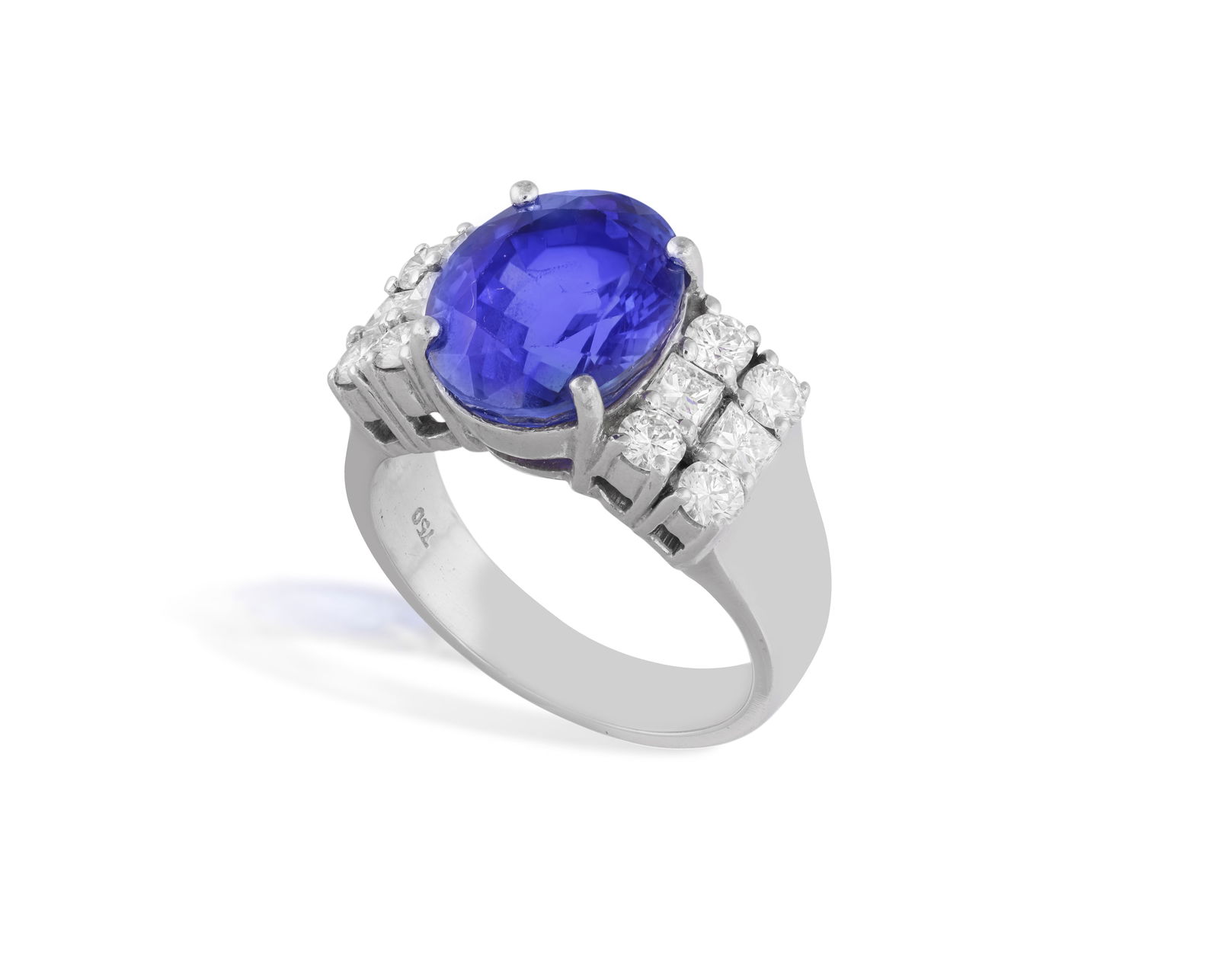 A TANZANITE AND DIAMOND DRESS RING * one oval-shaped tanzanite, approx. 5.20cts * square and (1 of 3)