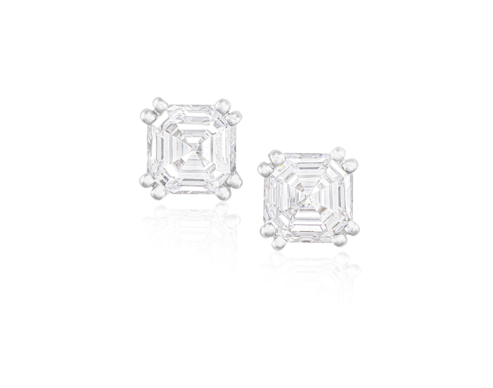 A PAIR OF DIAMOND EARSTUDS * asscher-cut diamonds * mounted in 18K gold * with maker’s mark * (1 of 2)