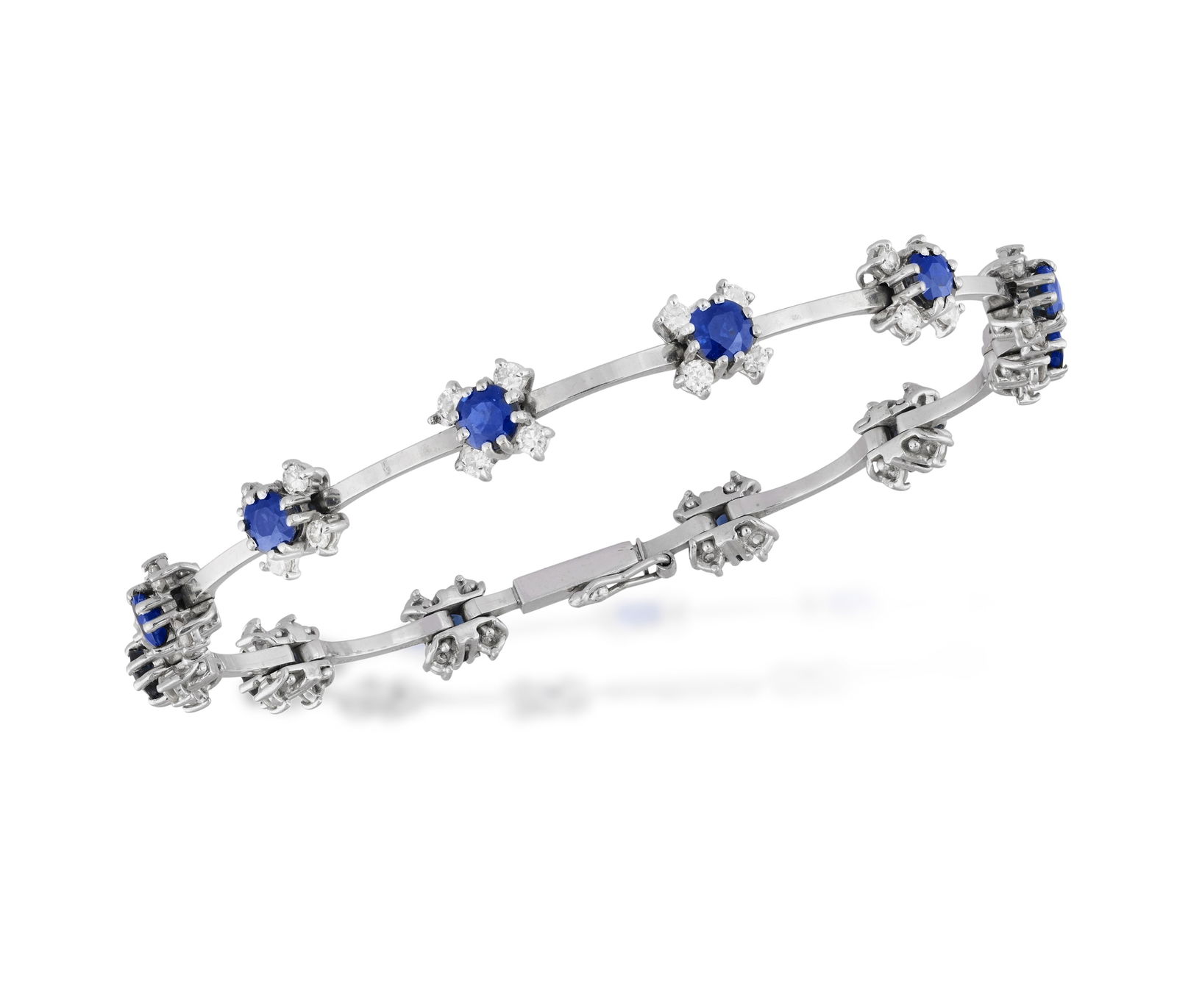 A SAPPHIRE AND DIAMOND BRACELET * circular-shaped sapphires * brilliant-cut diamonds, approx. (1 of 3)