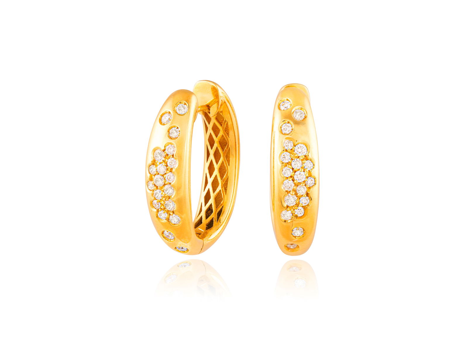 A PAIR OF DIAMOND HOOP EARRINGS * brilliant-cut diamonds, approx. 0.60ct total * mounted in 18K gold (1 of 2)