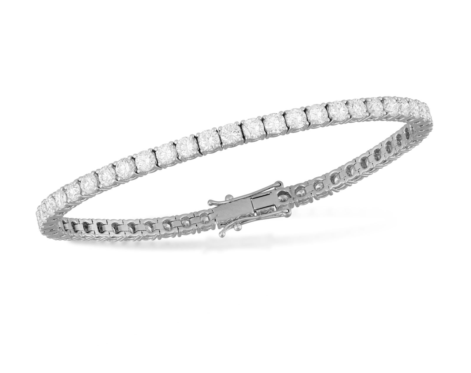 A DIAMOND LINE BRACELET * brilliant-cut diamonds, approx. 7.00cts total * mounted in 18K gold * (1 of 3)
