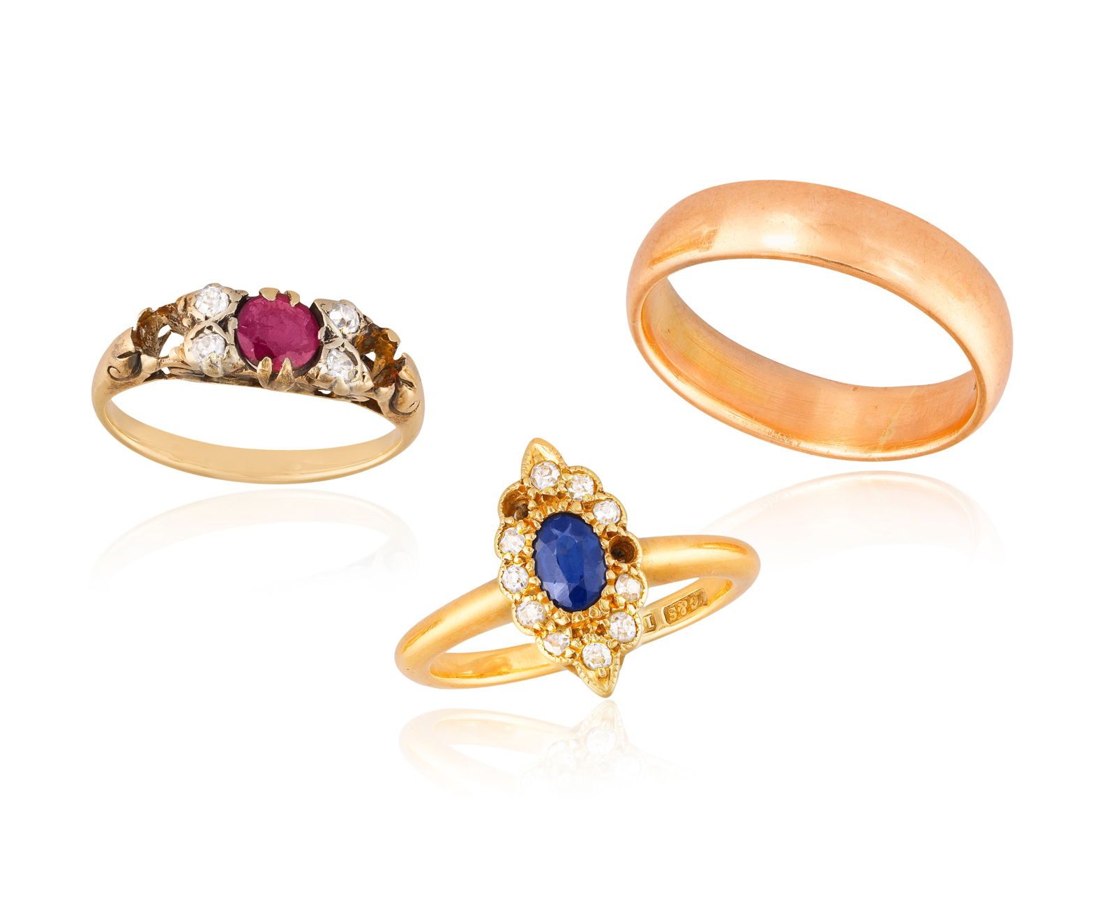 THREE GEM-SET AND DIAMOND RINGS * one with a circular-shaped ruby and four old-cut diamonds * ring (1 of 3)