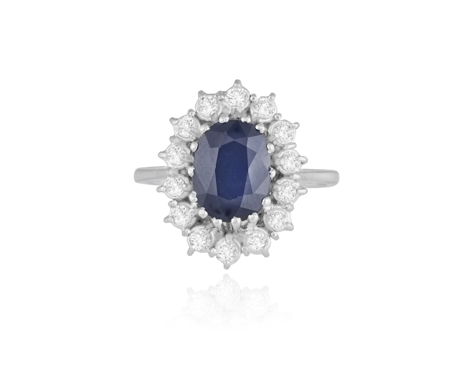 A SAPPHIRE AND DIAMOND RING * an oval-shaped sapphire, approx. 2.60cts * brilliant-cut diamonds,: A SAPPHIRE AND DIAMOND RING * an oval-shaped sapphire, approx. 2.60cts * brilliant-cut diamonds, approx. 0.70ct total * mounted in gold * ring size O_