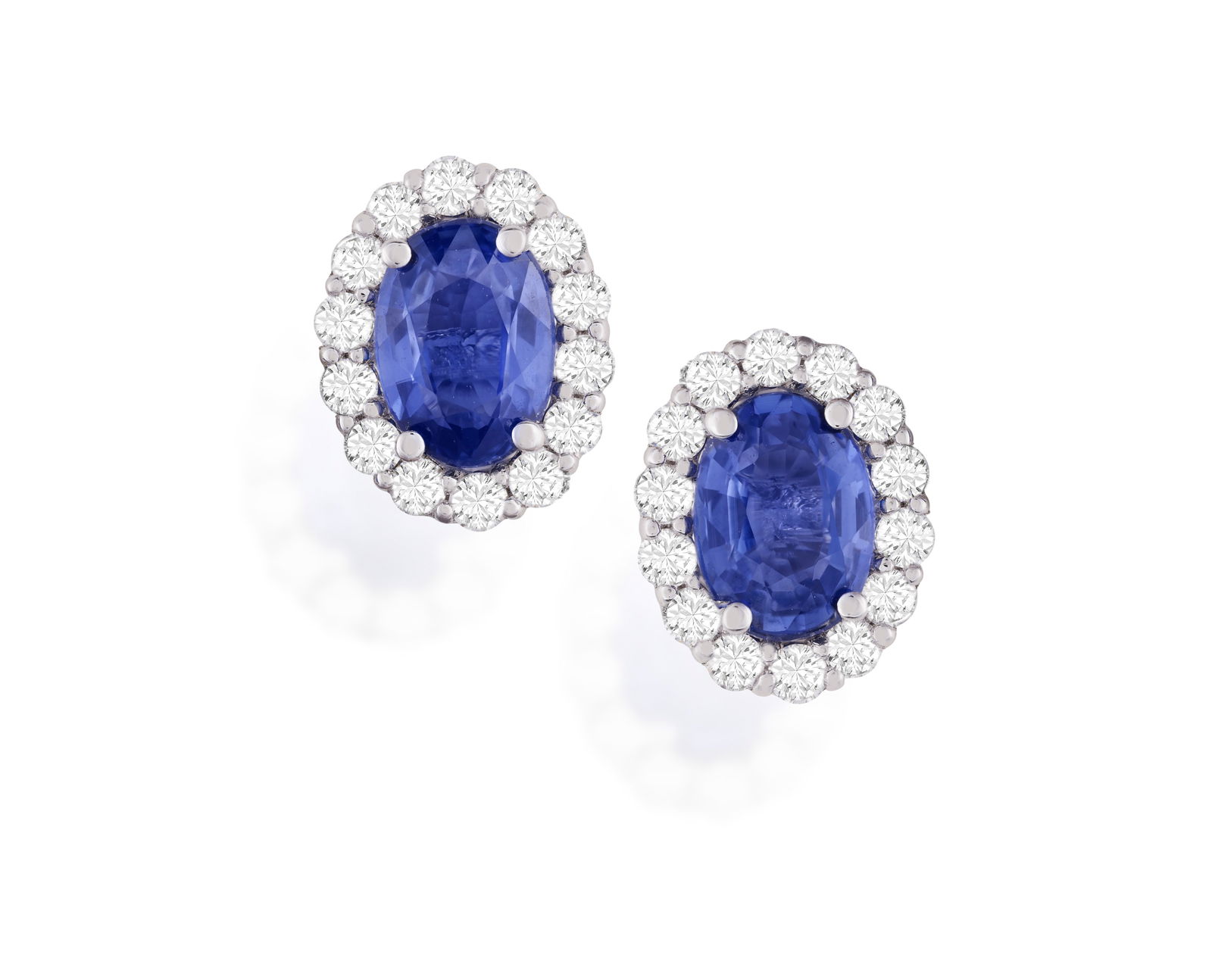 A PAIR OF SAPPHIRE AND DIAMOND EARRINGS * two oval-shaped sapphires, approx. 2.00cts total * (1 of 2)