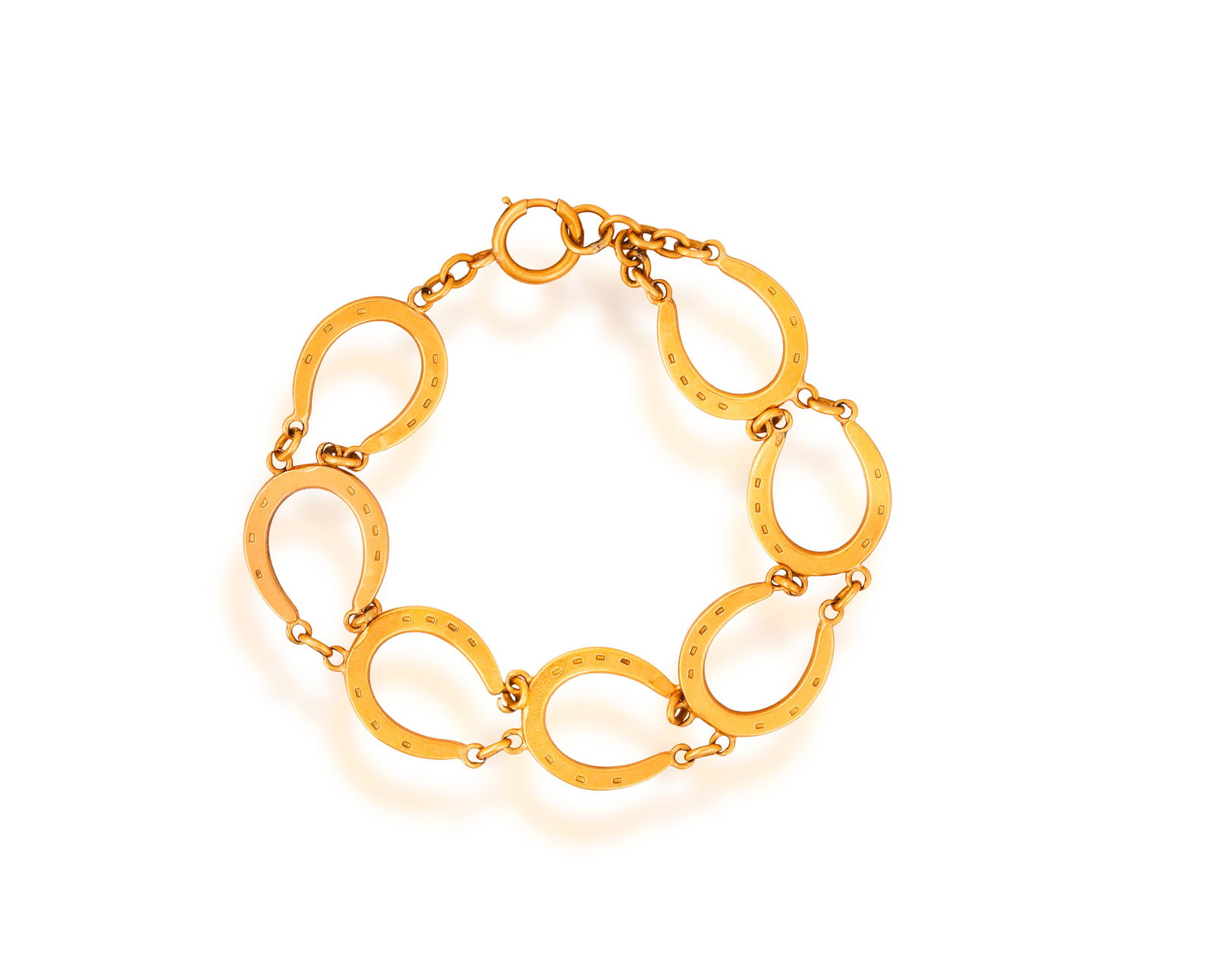 A GOLD BRACELET * horseshoe-shaped links * in 9K gold * inner circumference 19cm * This lot is (1 of 3)