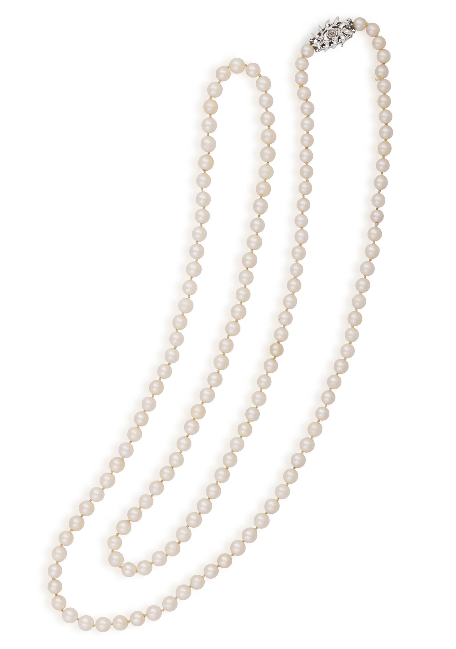 A CULTURED PEARL AND DIAMOND NECKLACE * cultured pearls of cream_tint, measuring from 6.2 to 7.3mm * (1 of 2)