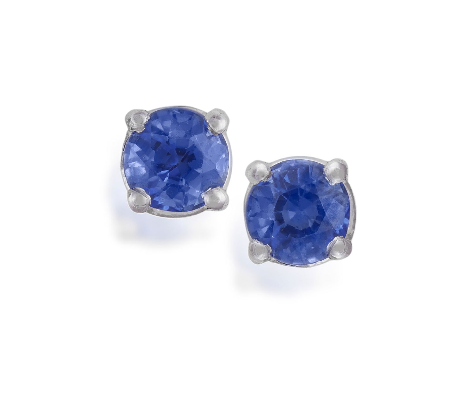 A PAIR OF SAPPHIRE EARSTUDS * two circular-cut sapphires * mounted in 18K gold * width 3mm (1 of 2)