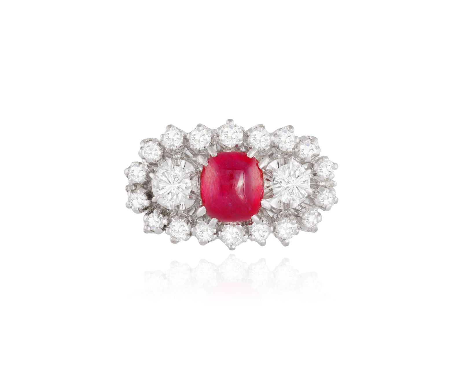 A RUBY AND DIAMOND DRESS RING * a cushion-shaped ruby cabochon, approx. 2.00cts * brilliant-cut (1 of 4)