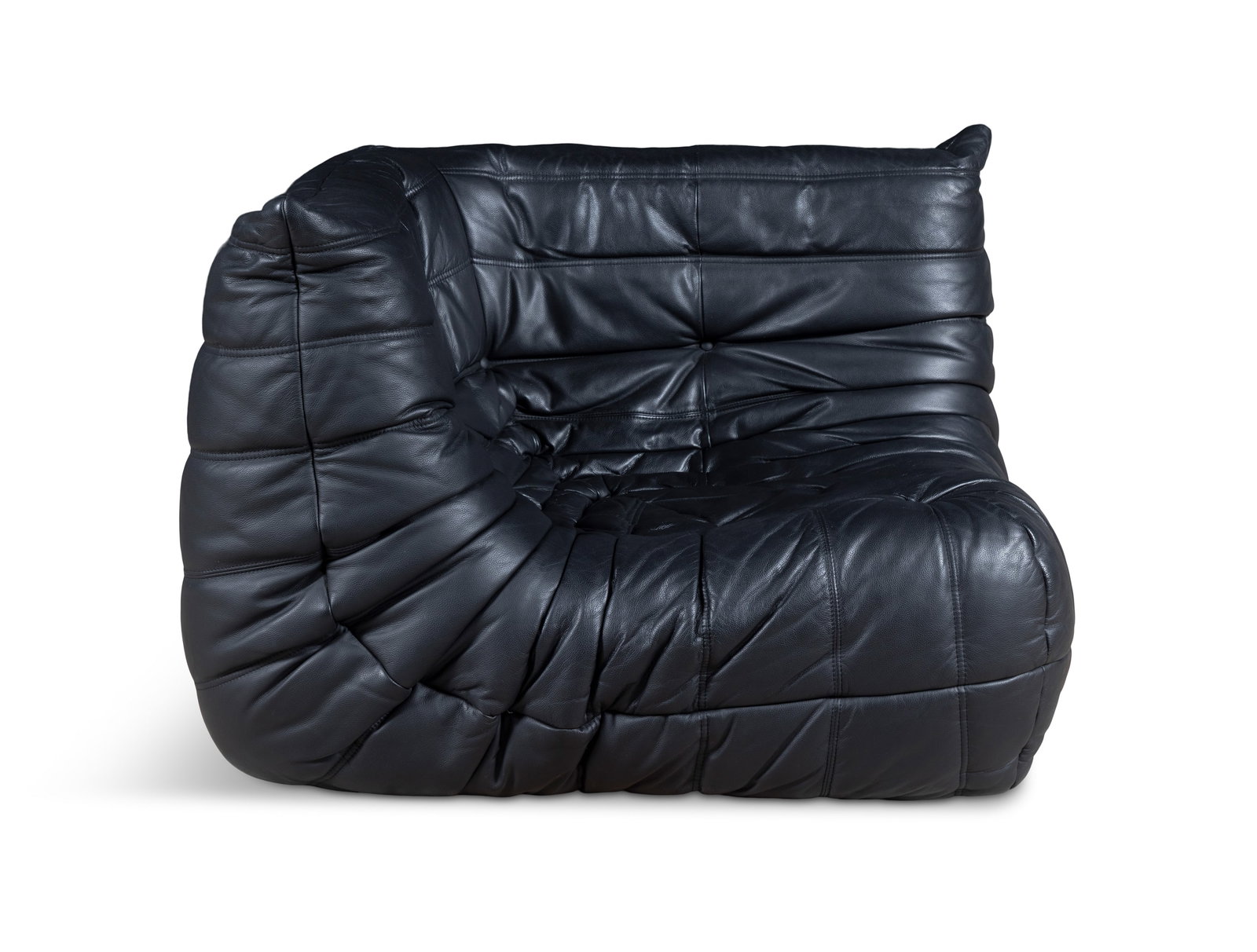 MICHEL DUCAROY (1925-2009) A Michel Ducaroy black leather corner Togo for Ligne Roset. With maker's: MICHEL DUCAROY (1925-2009) A Michel Ducaroy black leather corner Togo for Ligne Roset. With maker's label. 102 x 102 x 70cm(h); Seat: 38cm(h)