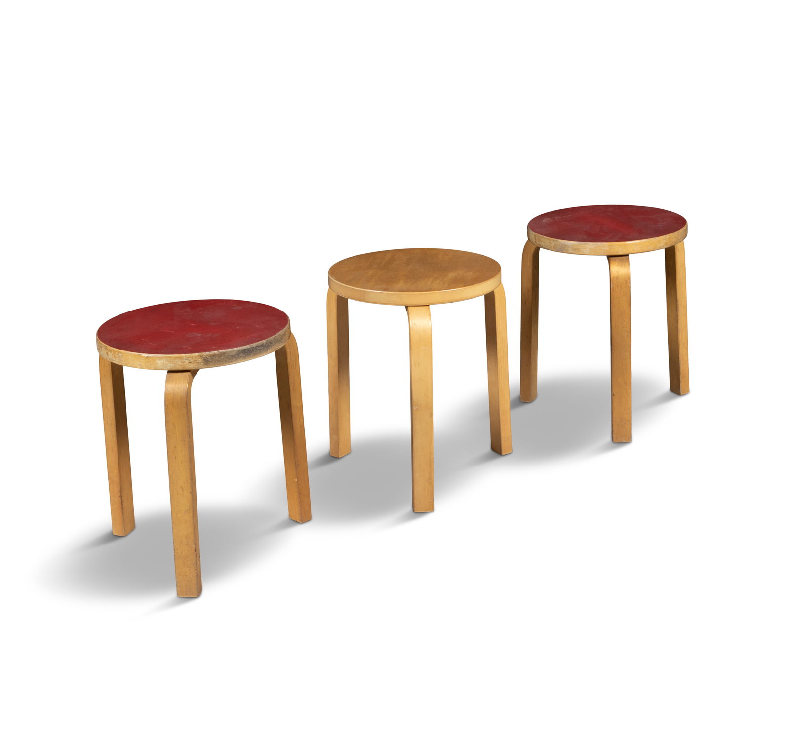 STOOLS A set of three stools in the style of Alvar Aalto. 35 x 45cm(h): STOOLS A set of three stools in the style of Alvar Aalto. 35 x 45cm(h)