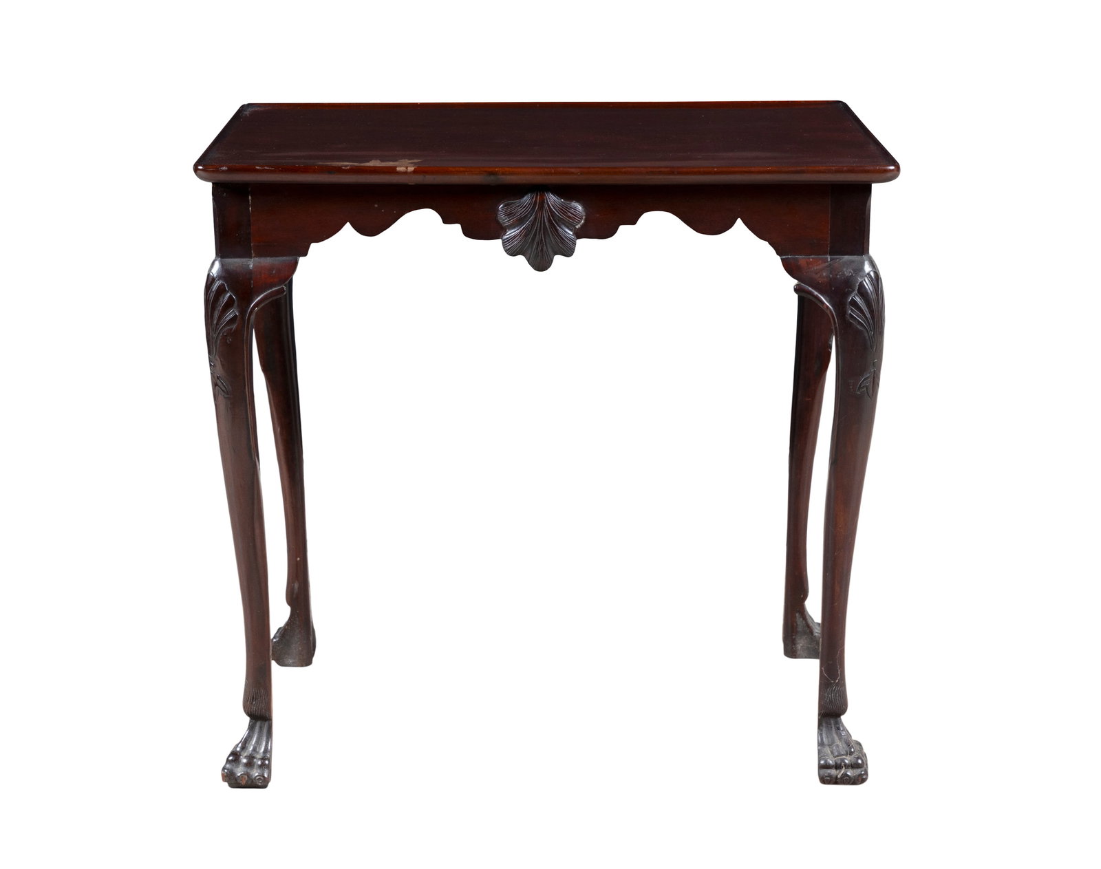 AN IRISH MAHOGANY SILVER TABLE, 19TH CENTURY, the shaped frieze centred by a shell, to either side: AN IRISH MAHOGANY SILVER TABLE, 19TH CENTURY, the shaped frieze centred by a shell, to either side on shell capped cabriole legs and paw feet , 71cm high, 74.5cm wide, 53cm deep