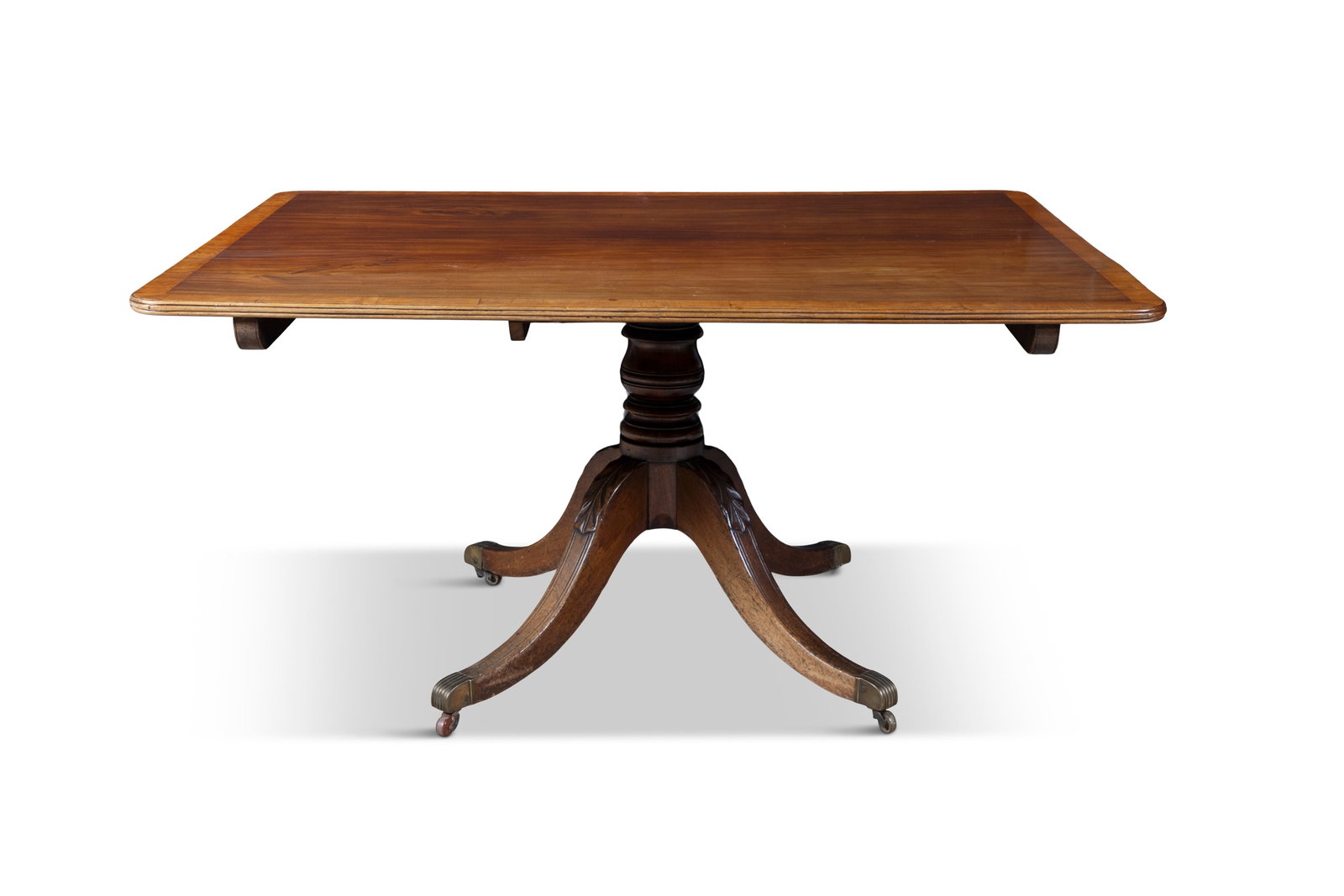 A GEORGE IV SATINWOOD AND CROSS BANDED RECTANGULAR TILT-TOP SUPPER TABLE, on a turned centre (1 of 5)