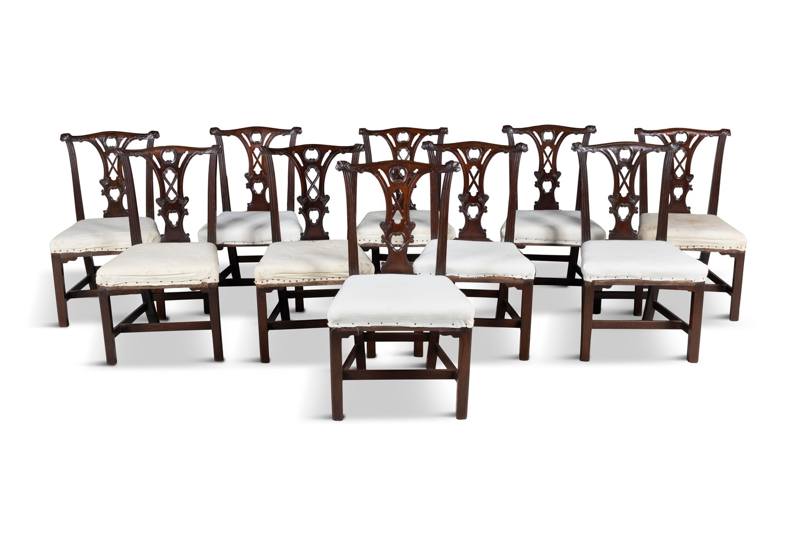 A SET OF TEN MAHOGANY FRAMED DINING CHAIRS IN THE CHIPPENDALE TASTE, Attributed to Butler, the (1 of 6)
