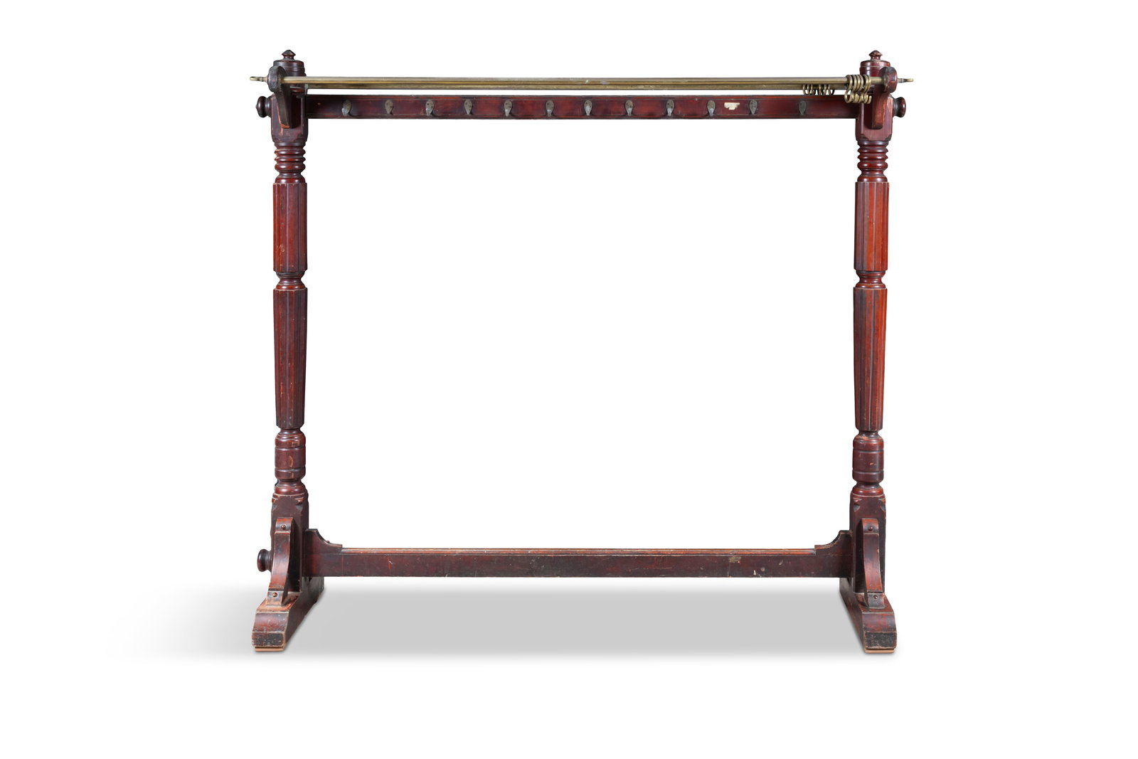 A MAHOGANY AND BRASS CLOAKROOM STAND, on fluted pillar end supports with splayed block feet and (1 of 7)