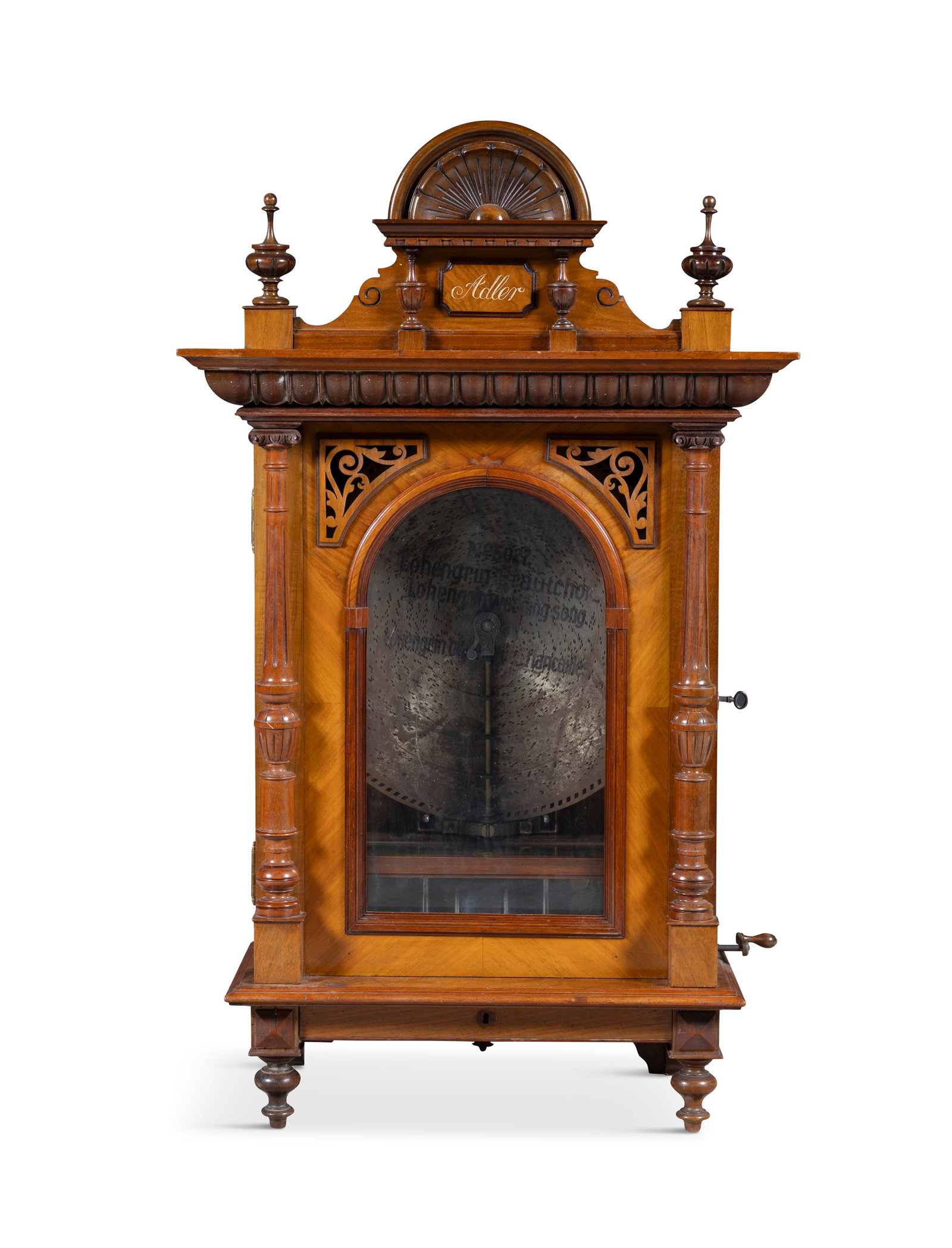 A GERMAN 'ADLER' WALNUT CASED POLYPHON MUSIC CABINET, fitted with a coin operated mechanism, with (1 of 10)