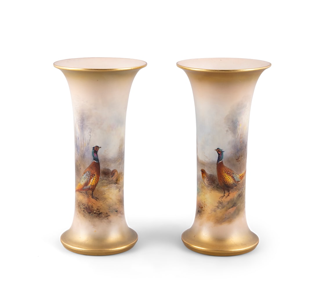 A PAIR OF ROYAL WORCESTER PORCELAIN VASES OF TRUMPET FORM, with gilded rims and bases, decorated (1 of 6)