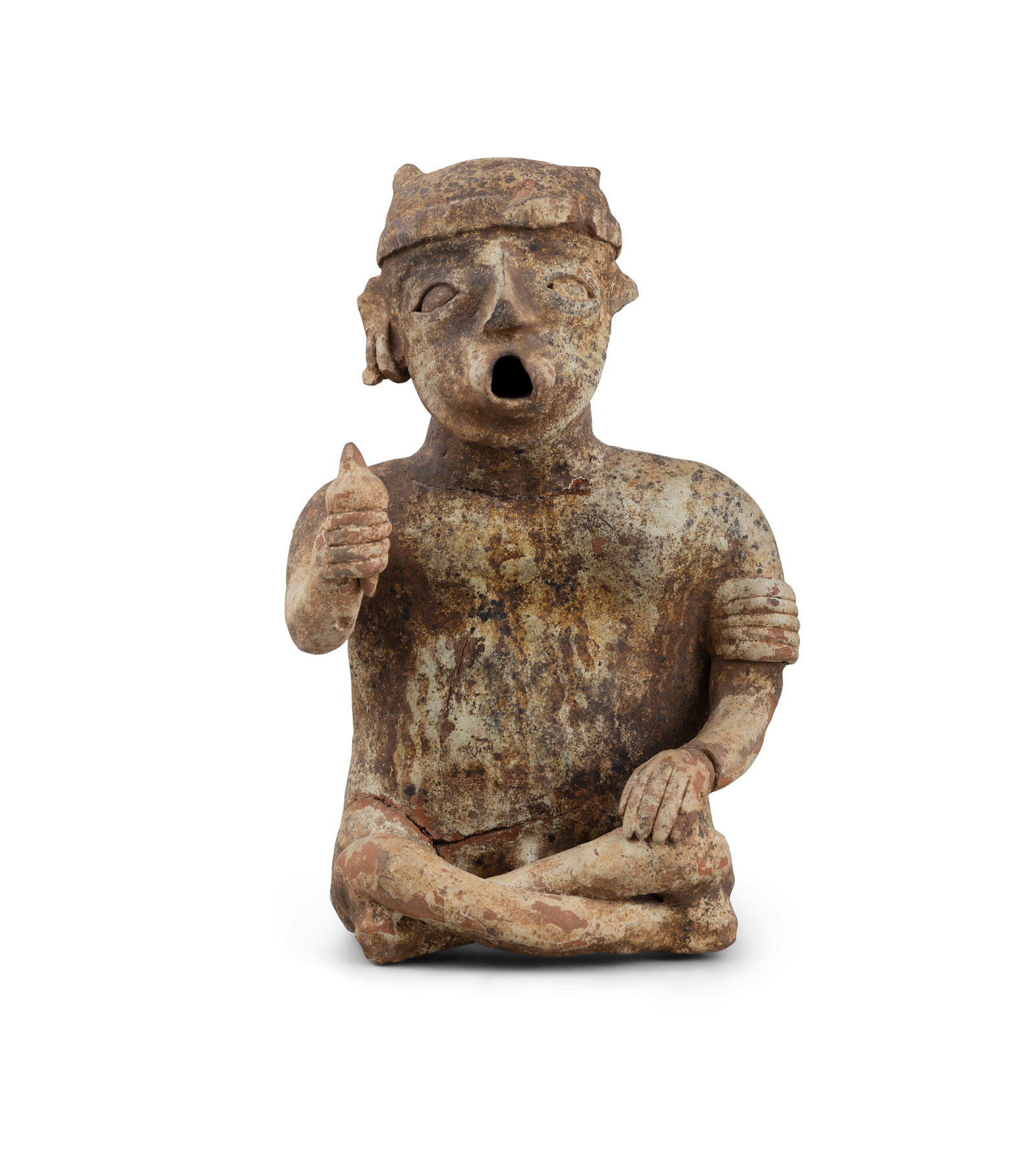 A PRE-COLUMBIAN TERRACOTTA SEATED MALE FIGURE in a crossed leg pose, with opening at the mouth, (1 of 4)